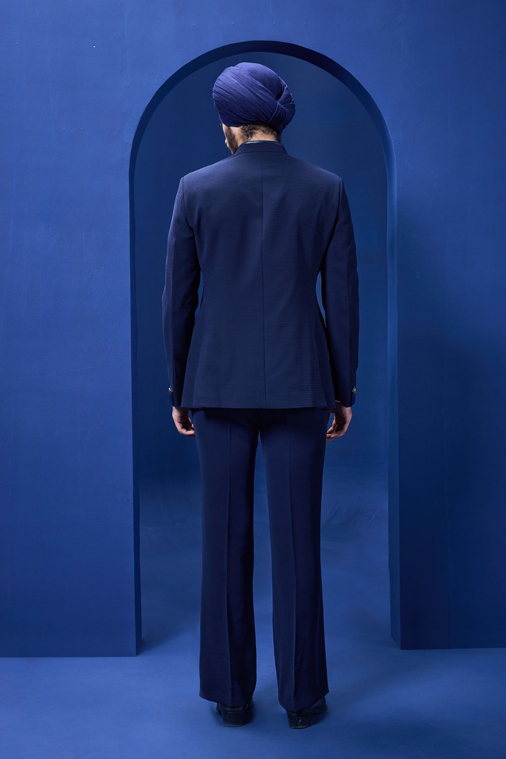 Navy blue bandhgala detailing with golden button satin taping