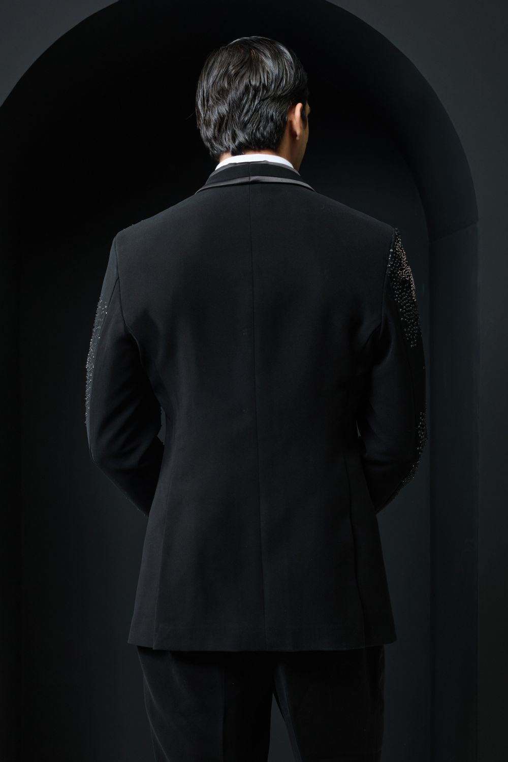 Black tuxedo highlighted with sequins, pearls,cutdana