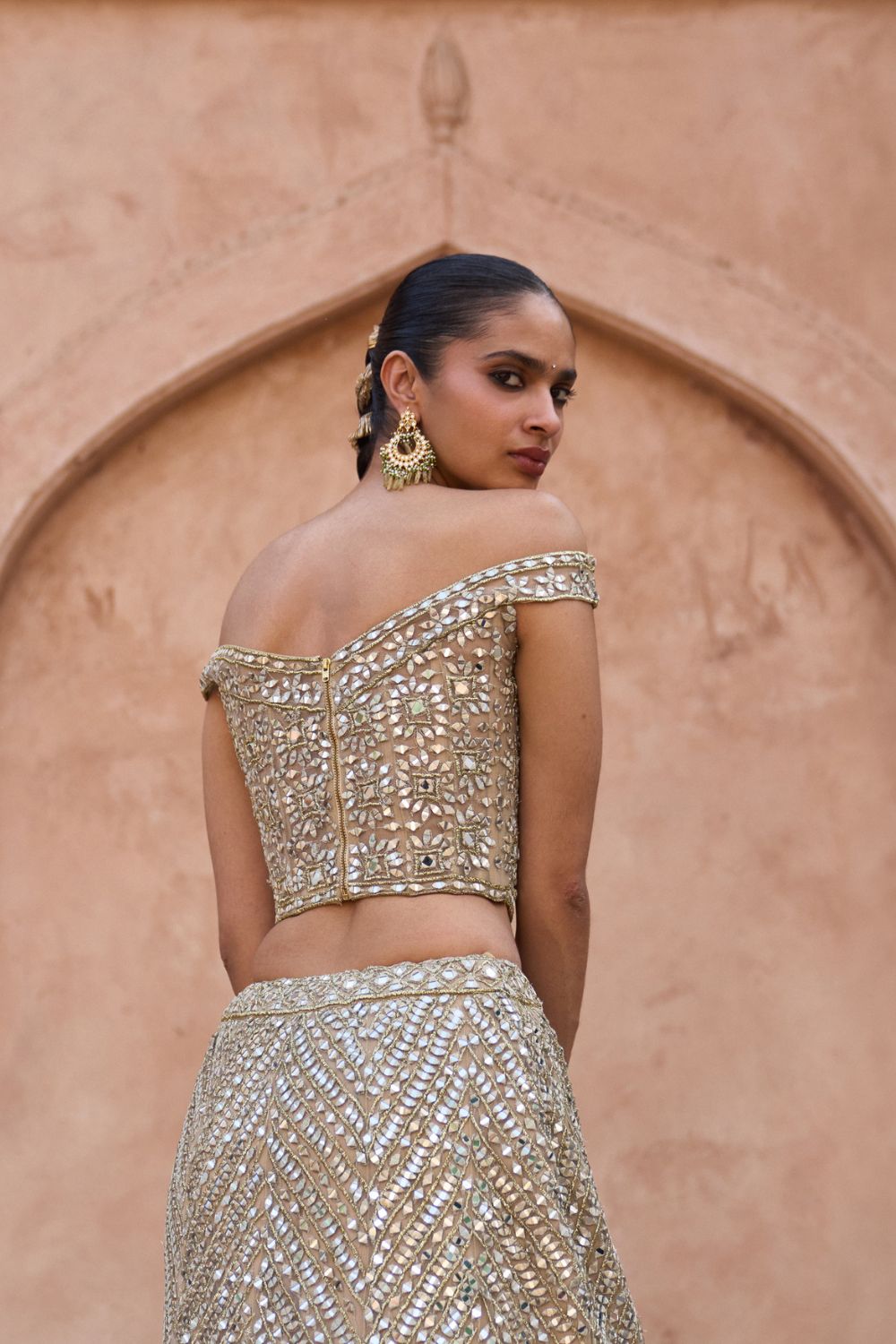 SUNEHRI — Antique Gold Net Lehenga Set