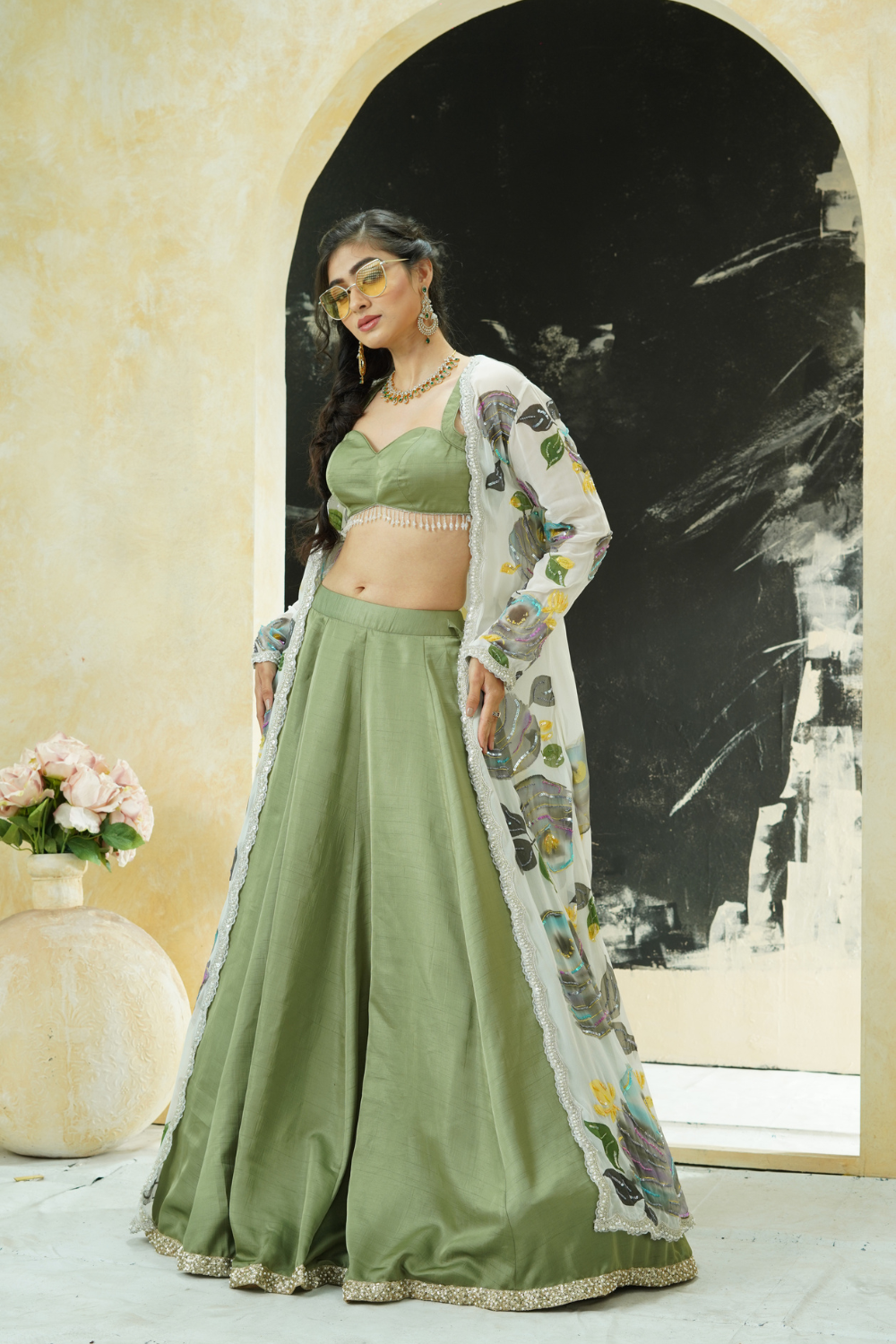 Sage Green lehenga set with hand painted jacket