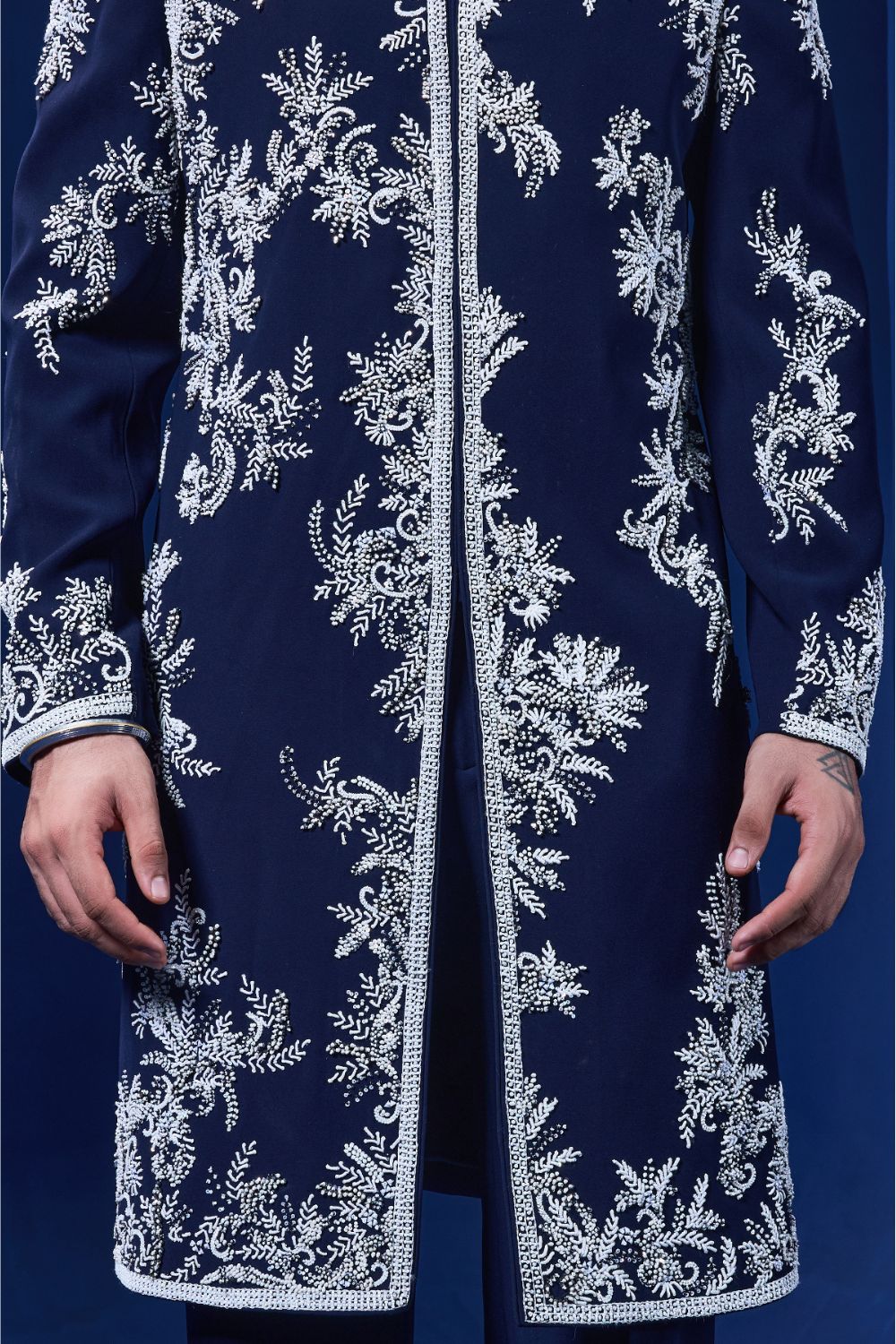 Navy blue Indo Western highlighted with sequins, pearls, cutdana and spring thread work