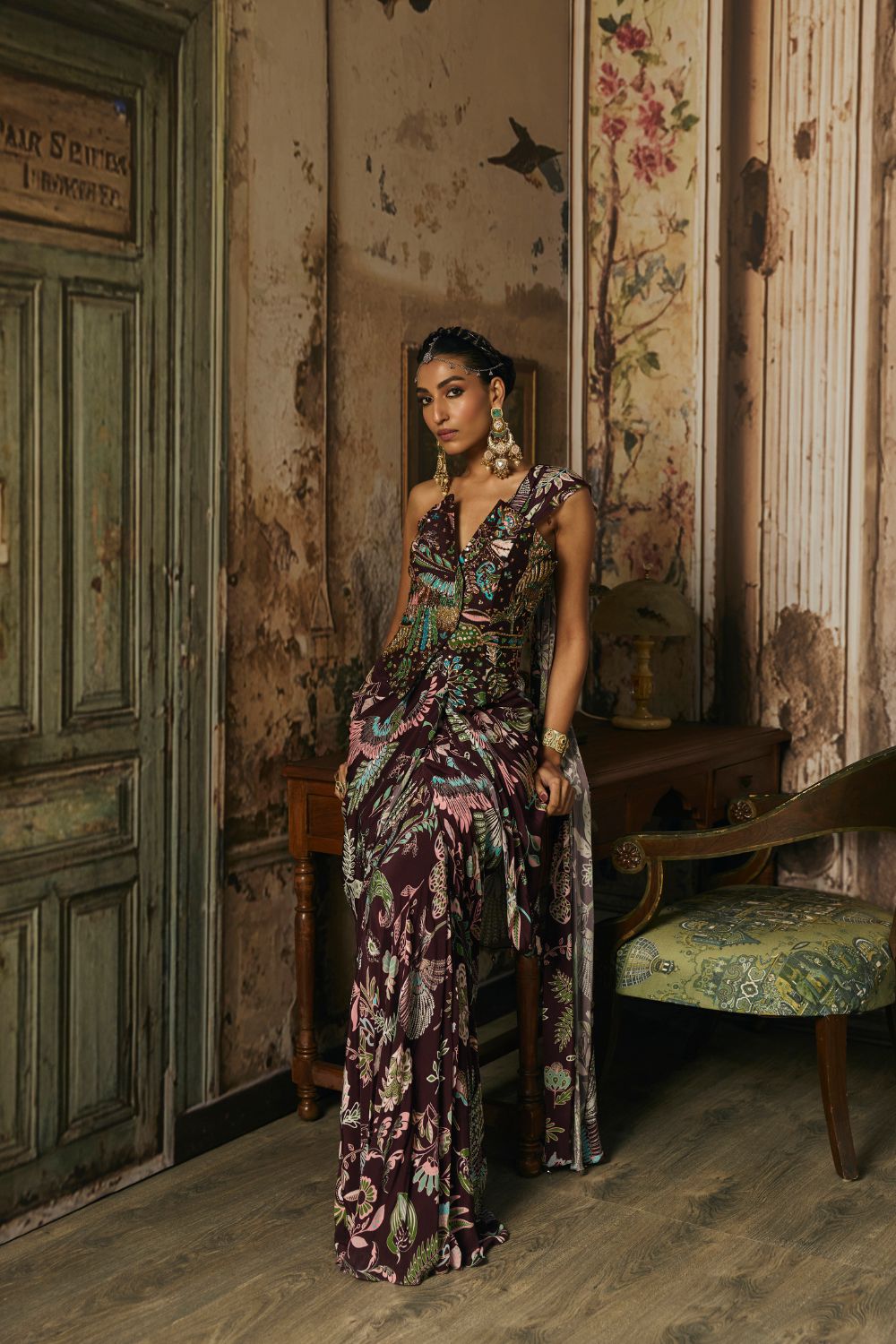 PLUM PRINTED AND HIGHLIGHTED CORSET WITH DHOTI SKIRT SAREE SET