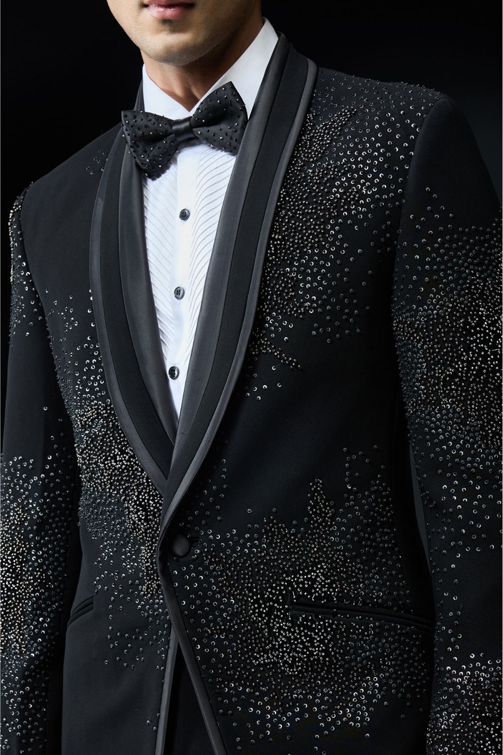 Black tuxedo highlighted with sequins, pearls,cutdana