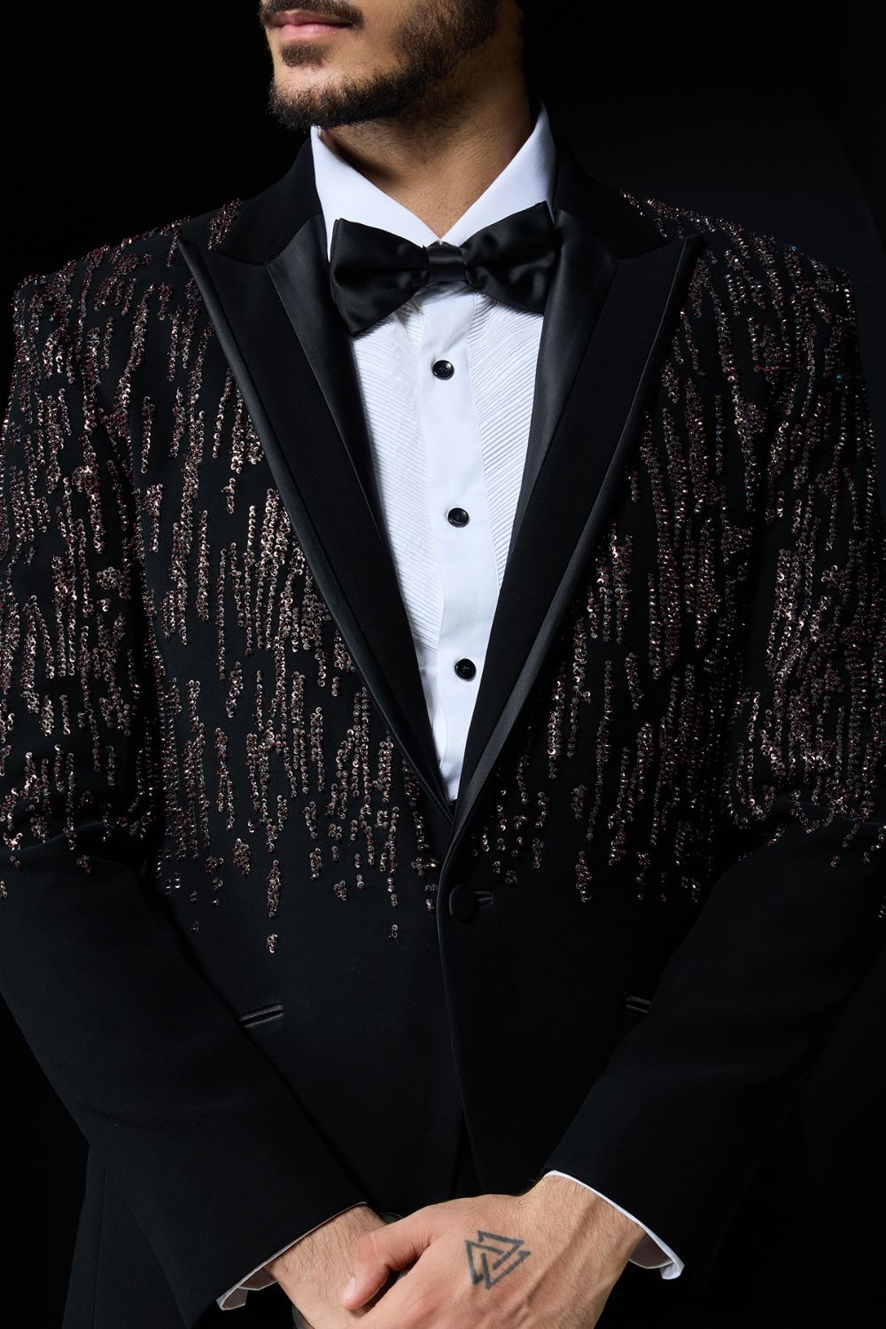 Black tuxedo highlighted with pearls, sequins and thread work