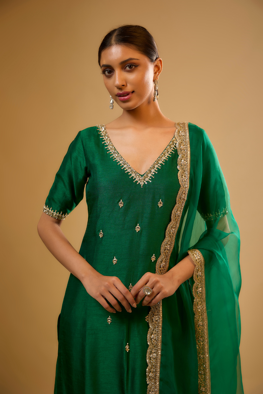 Emerald green semi dupion kurta pants set with mirrors and gold embroidery