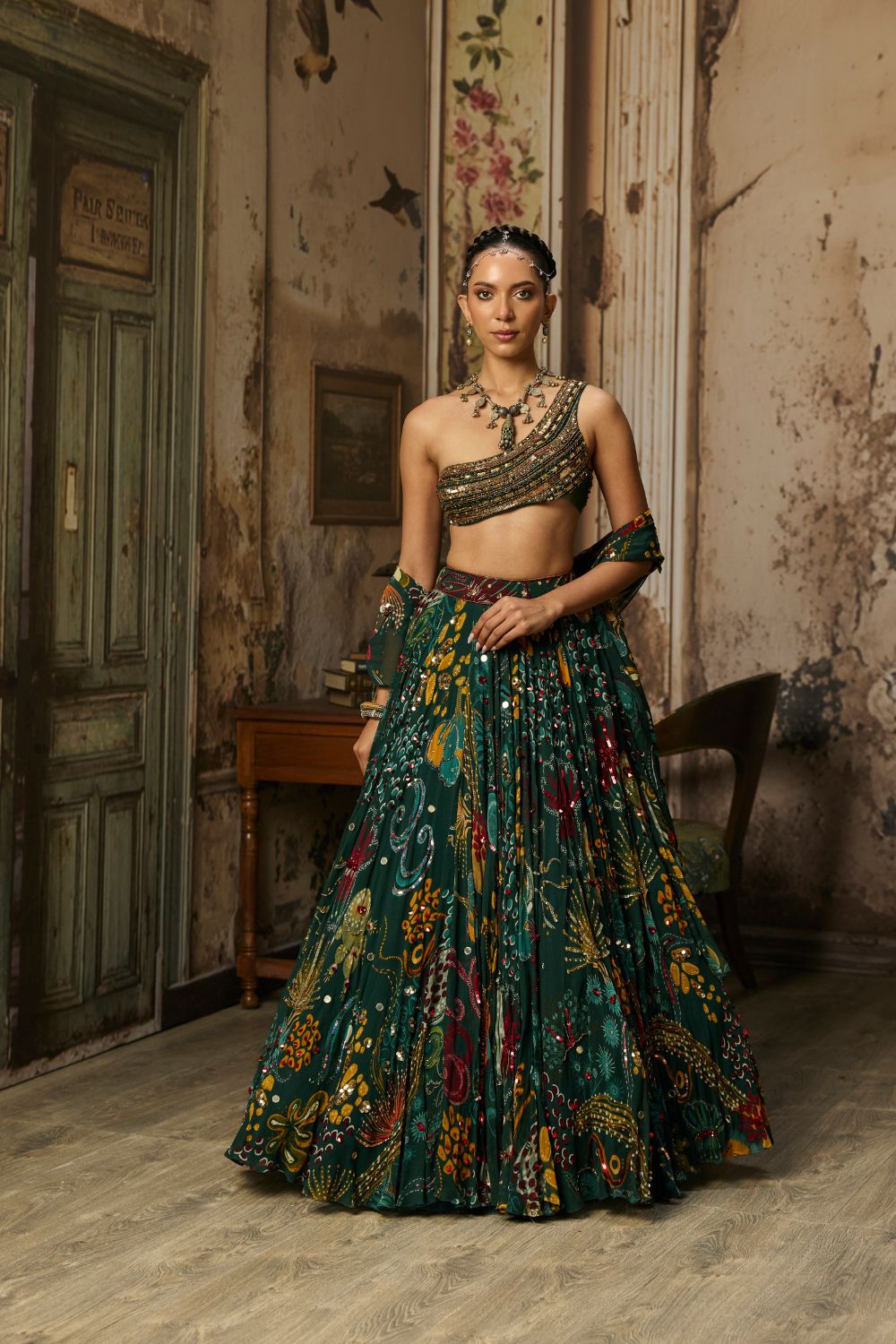 DARK GREEN EMBELLISHED BOUSE WITH PRINTED AND HIGHLIGHTED LEHENGA SET