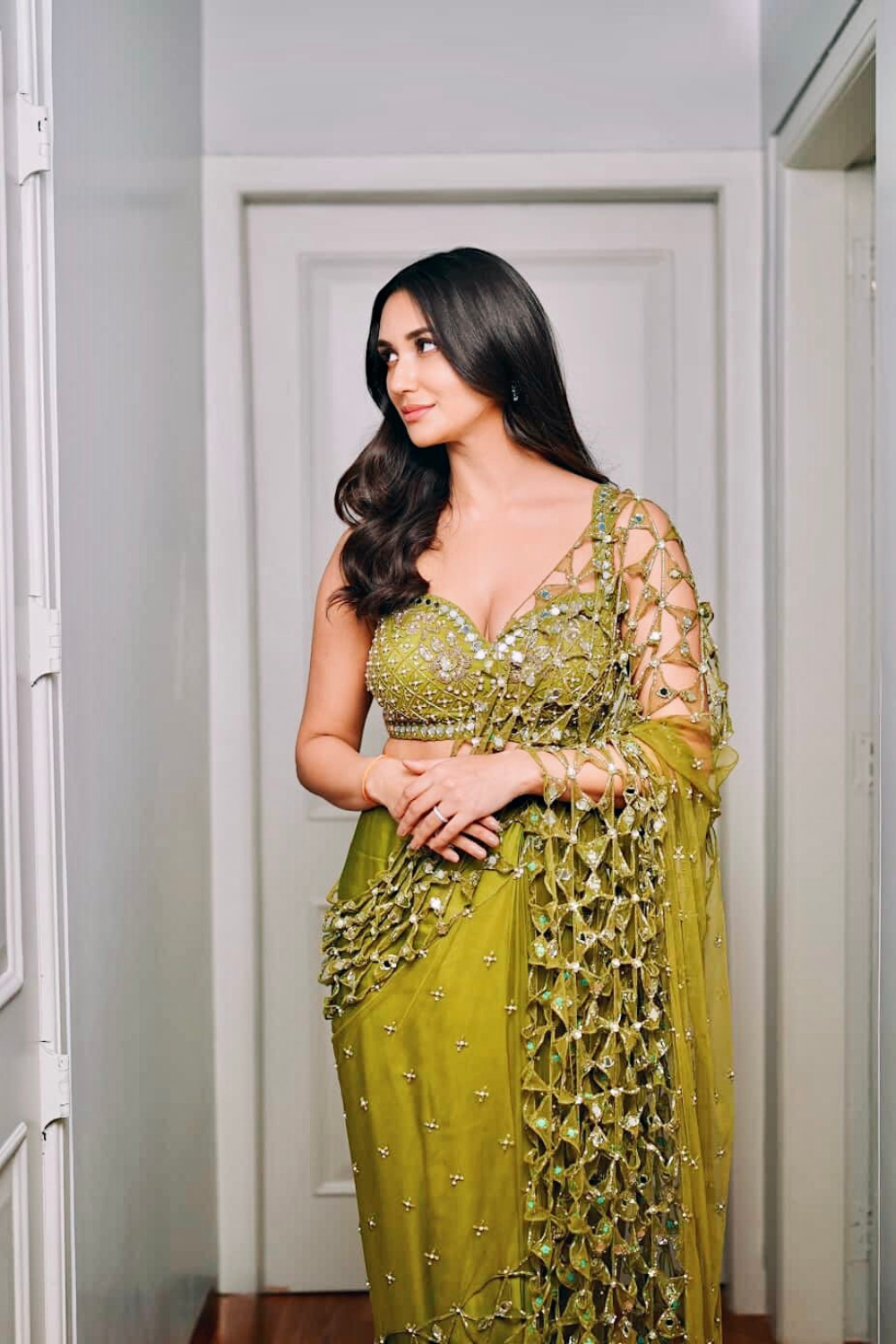 Predraped , mehendi green , hand embroidered net & satin saree