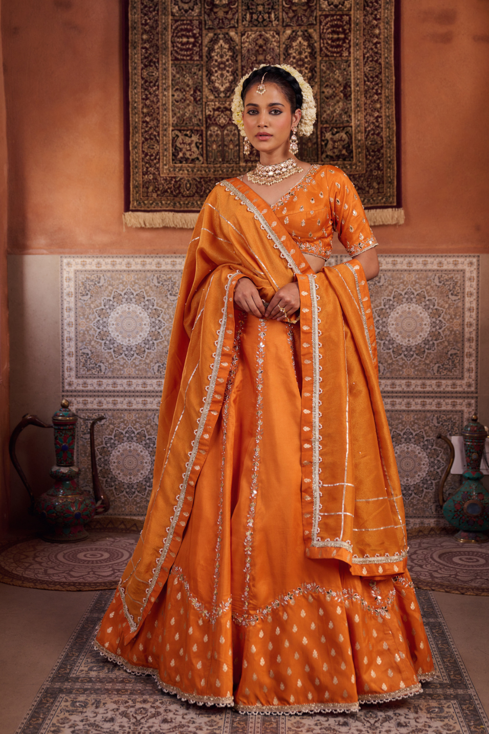 Rust orange silk embroidered blouse, lehenga and dupatta