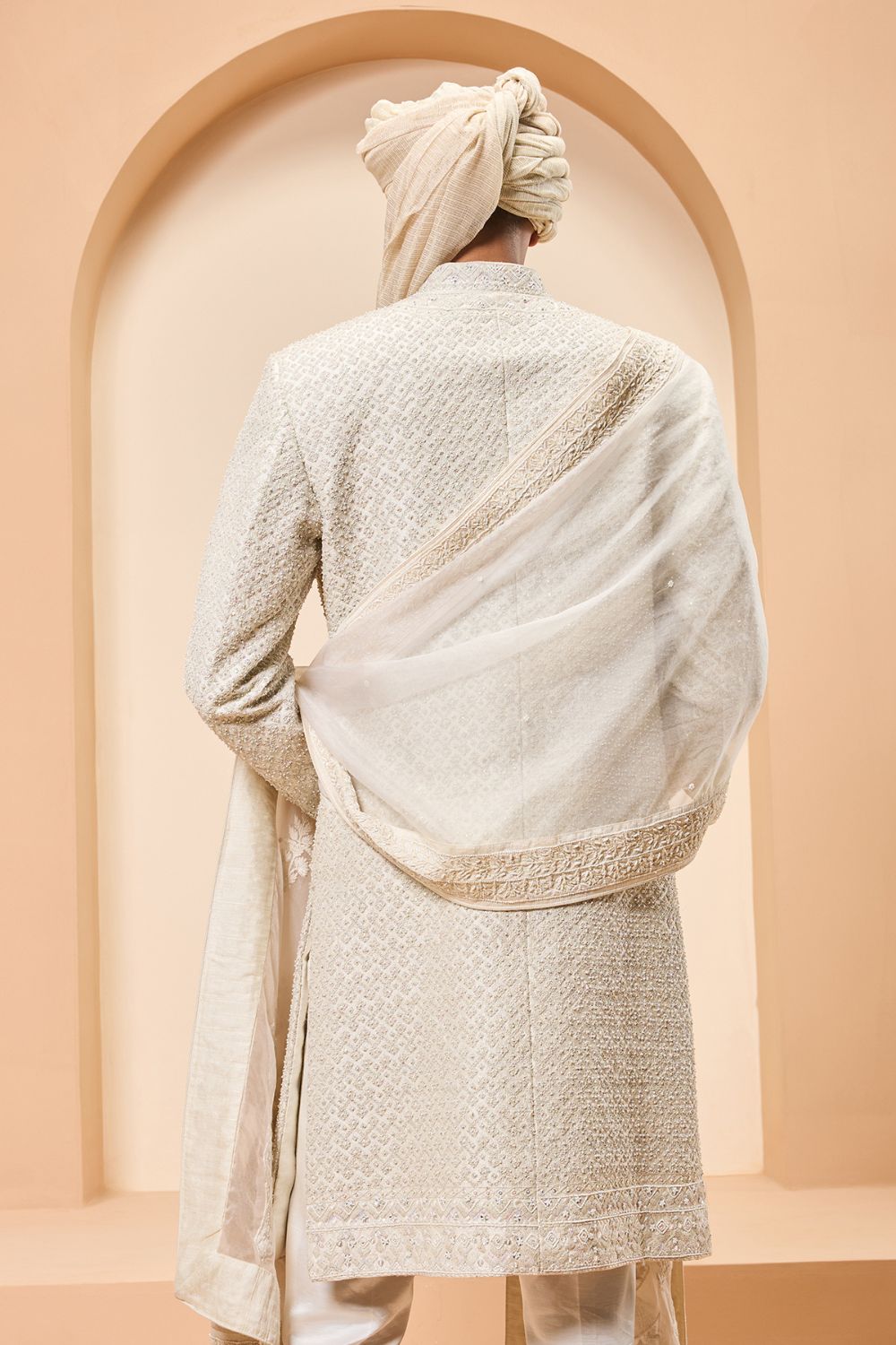 Ivory sherwani detailing with pearl, rainbow sequins and thread work