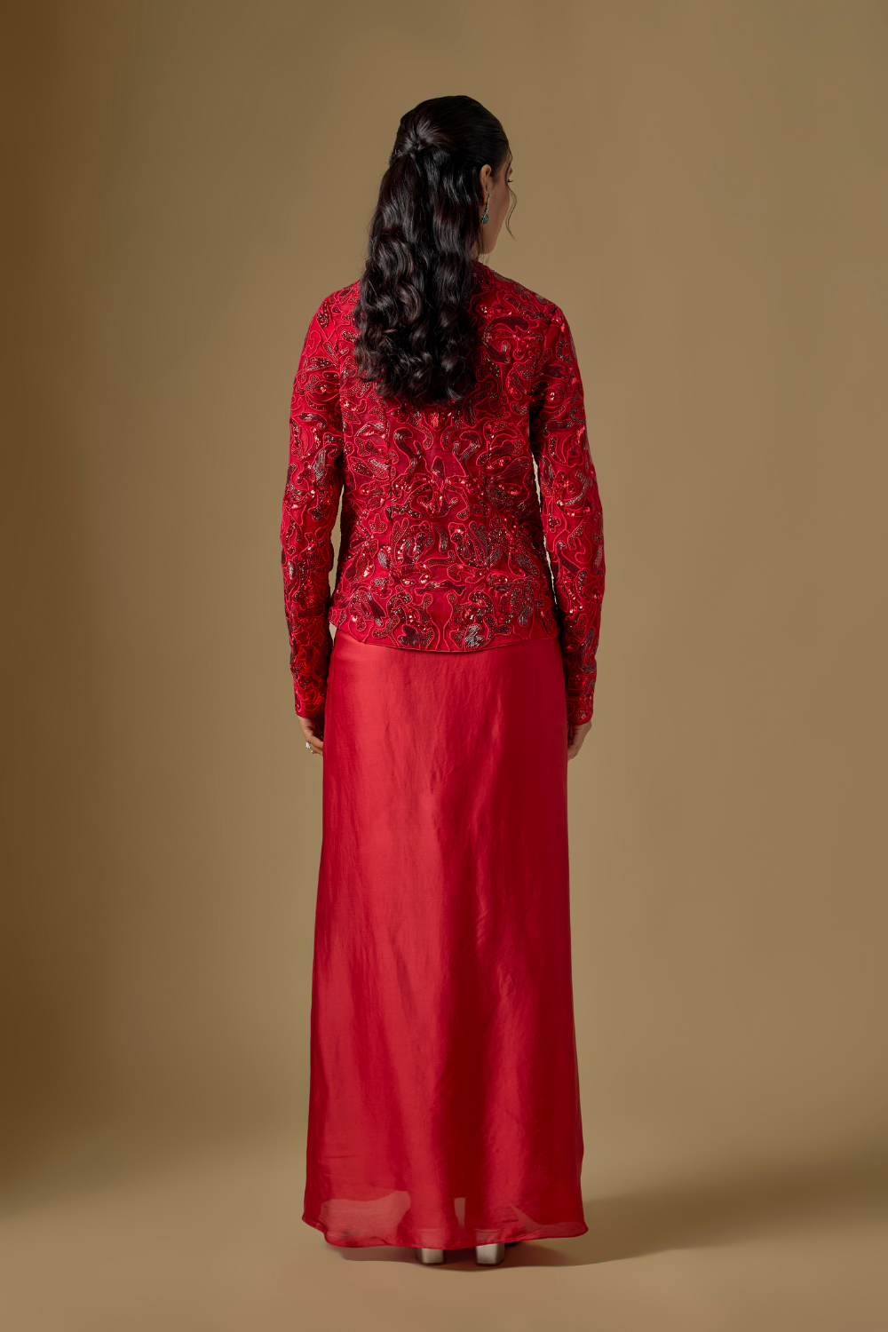 Torrin- Red tulle hand embroidered jacket paired with satin organza drape.