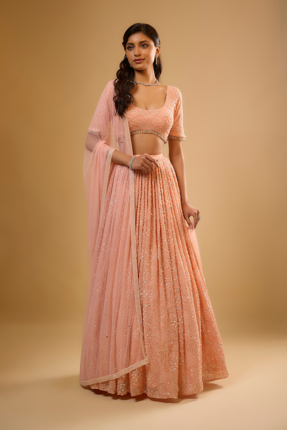 Peach sorbet georgette Lehenga set embroidered with sequins, glass beads & threadwork