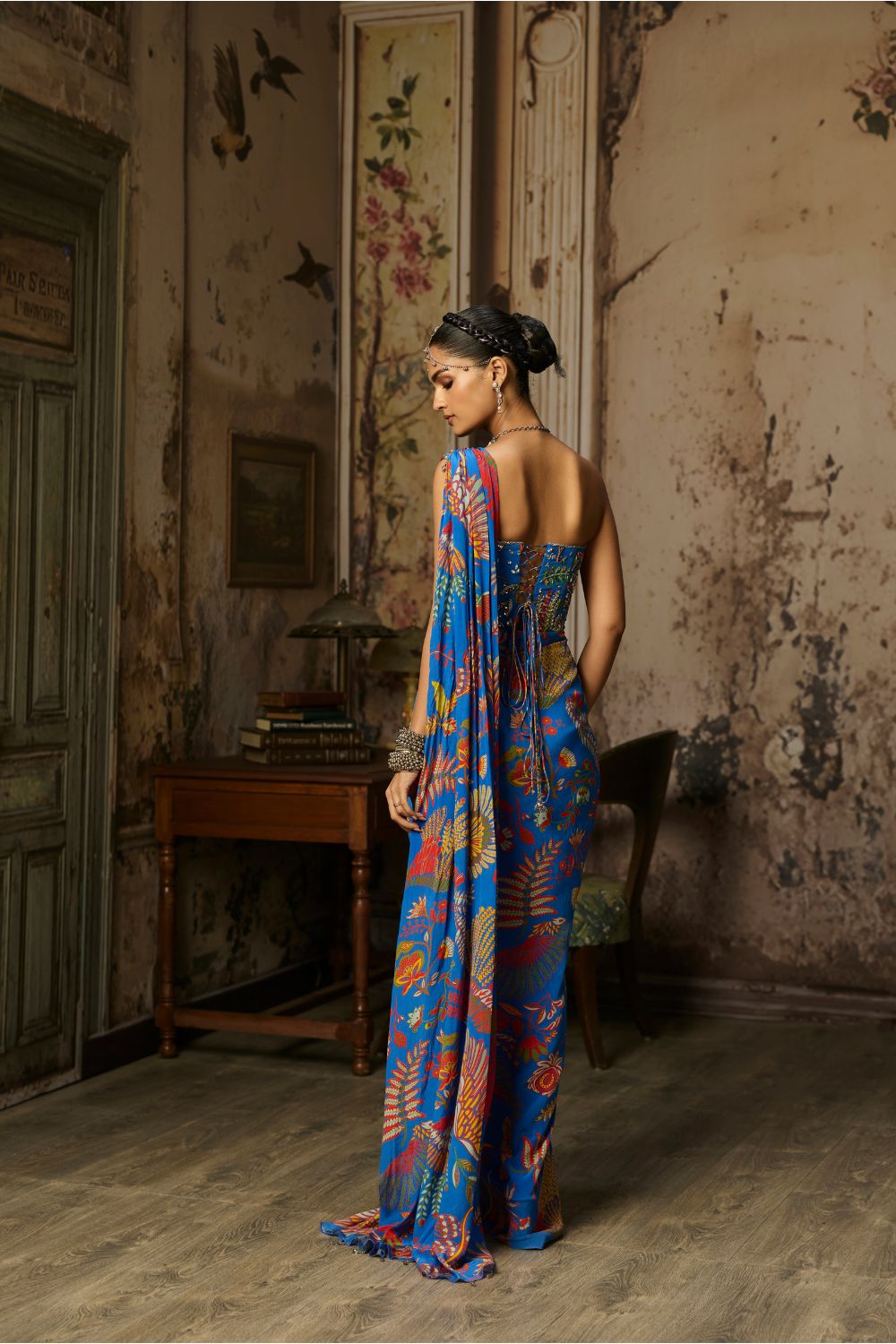 ELECTRIC BLUE PRINTED AND HIGHLIGHTED CORSET DHOTI SKIRT SAREE SET