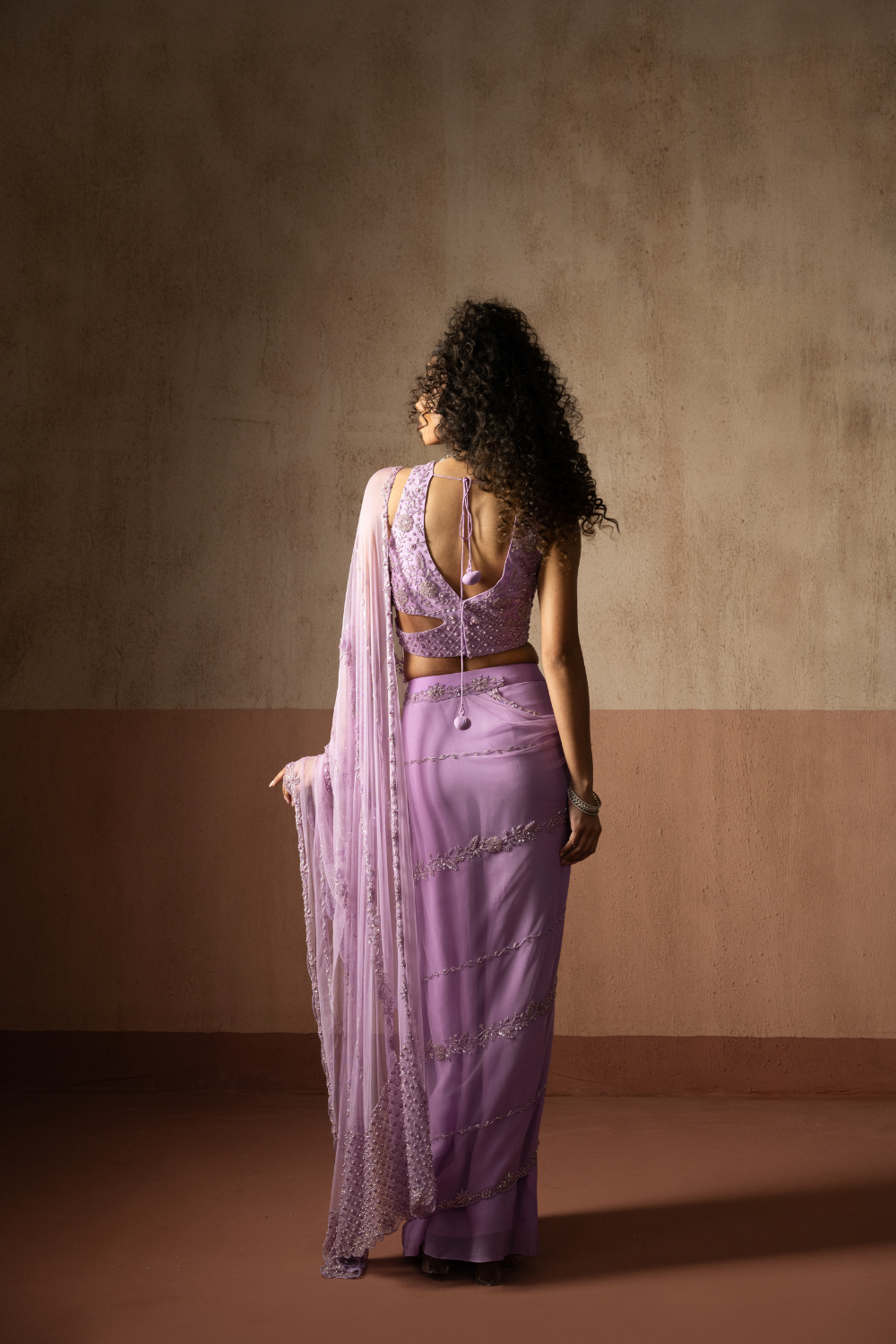 Predraped , lavender, hand embroidered net & georgette saree