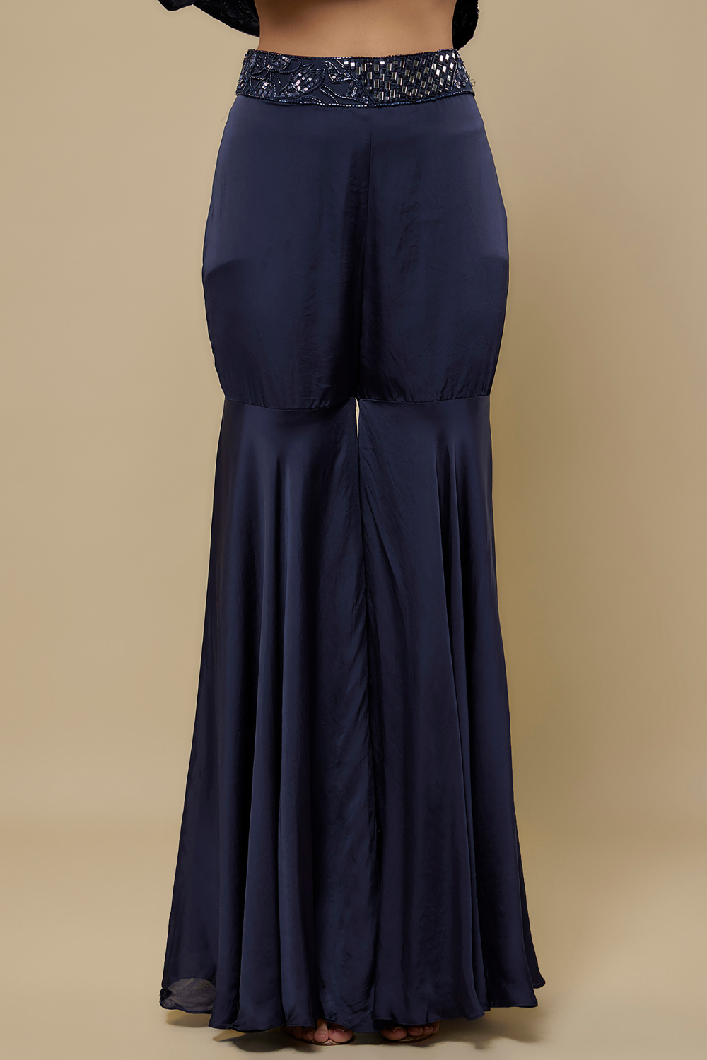 Punzel navy blue full embroidered peplum top paired with satin organza sharara