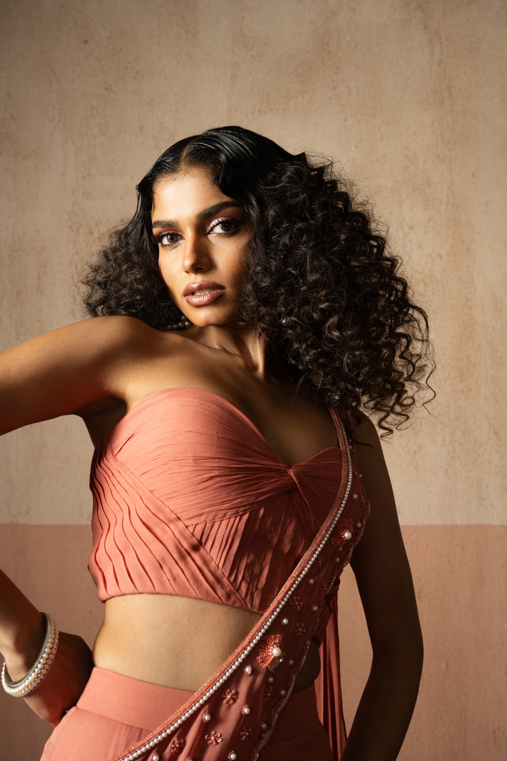 Fishtail style , peach coloured, hand embroidered georgette fishtail saree