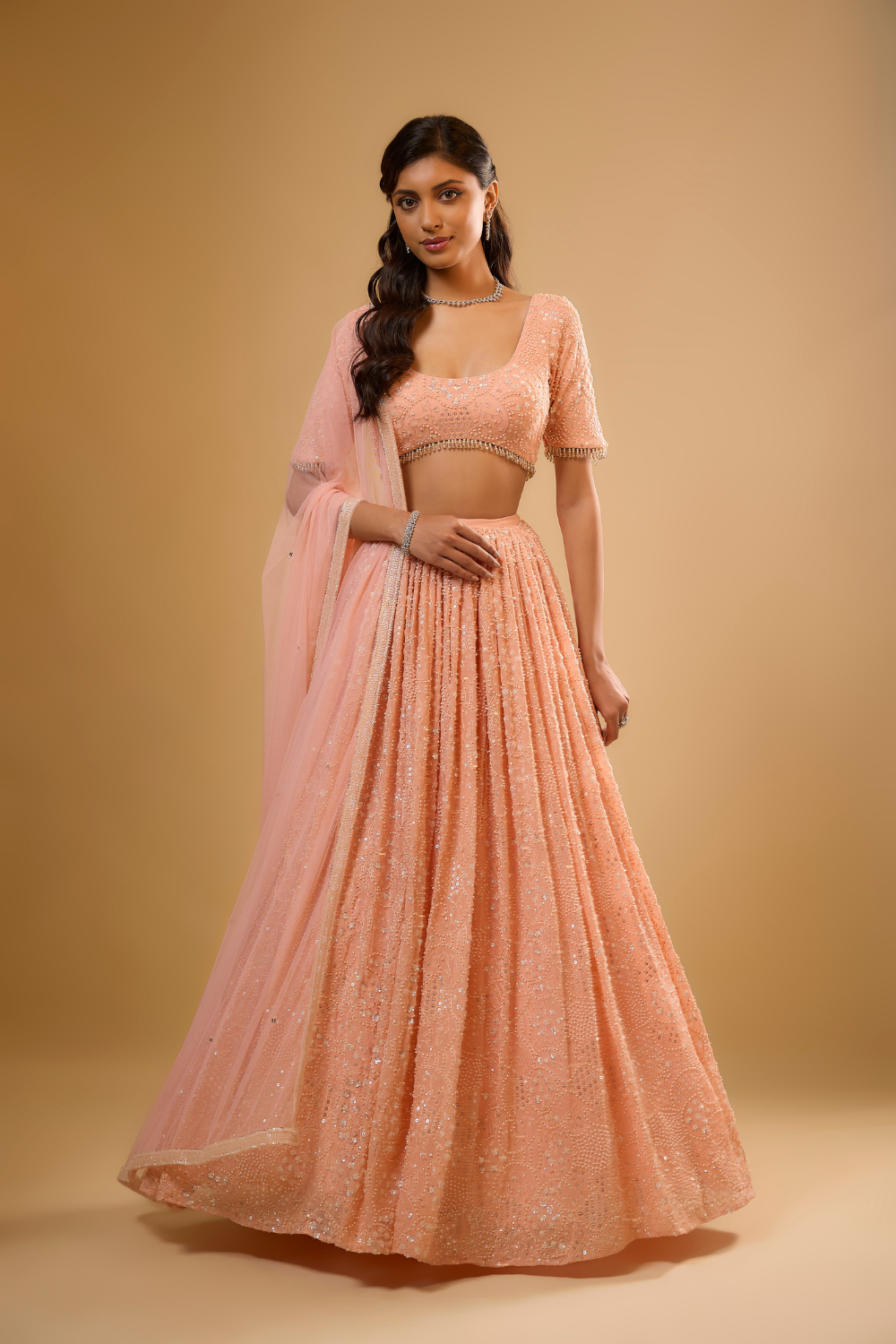 Peach sorbet georgette Lehenga set embroidered with sequins, glass beads & threadwork