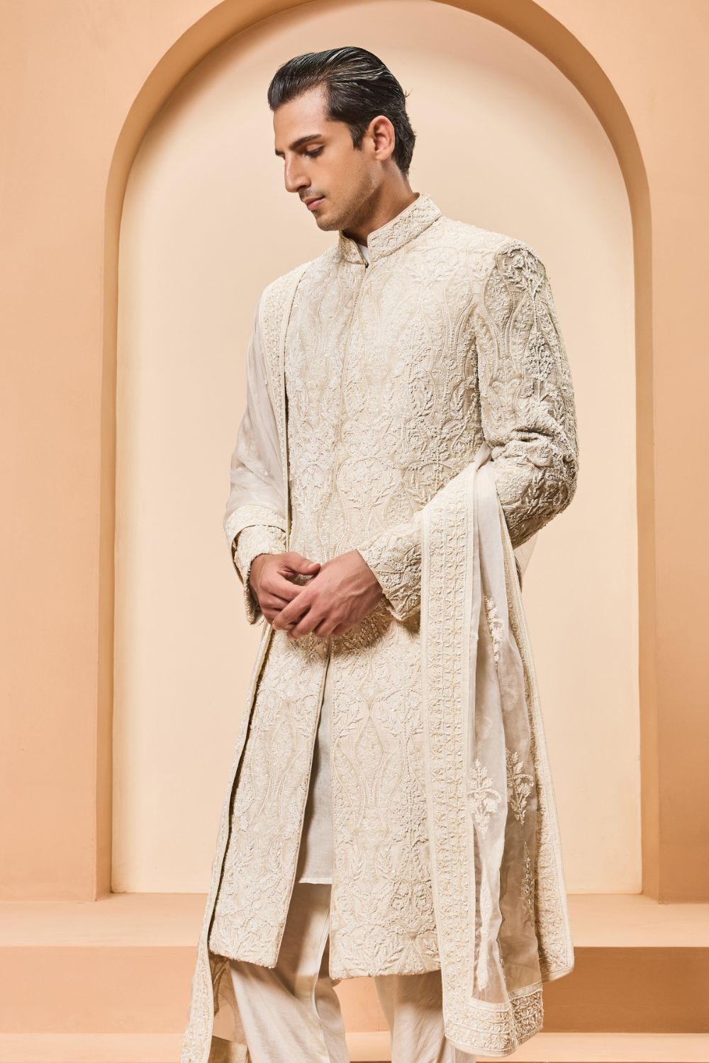 Ivory sherwani detailing with pearl,sequins and aplic work