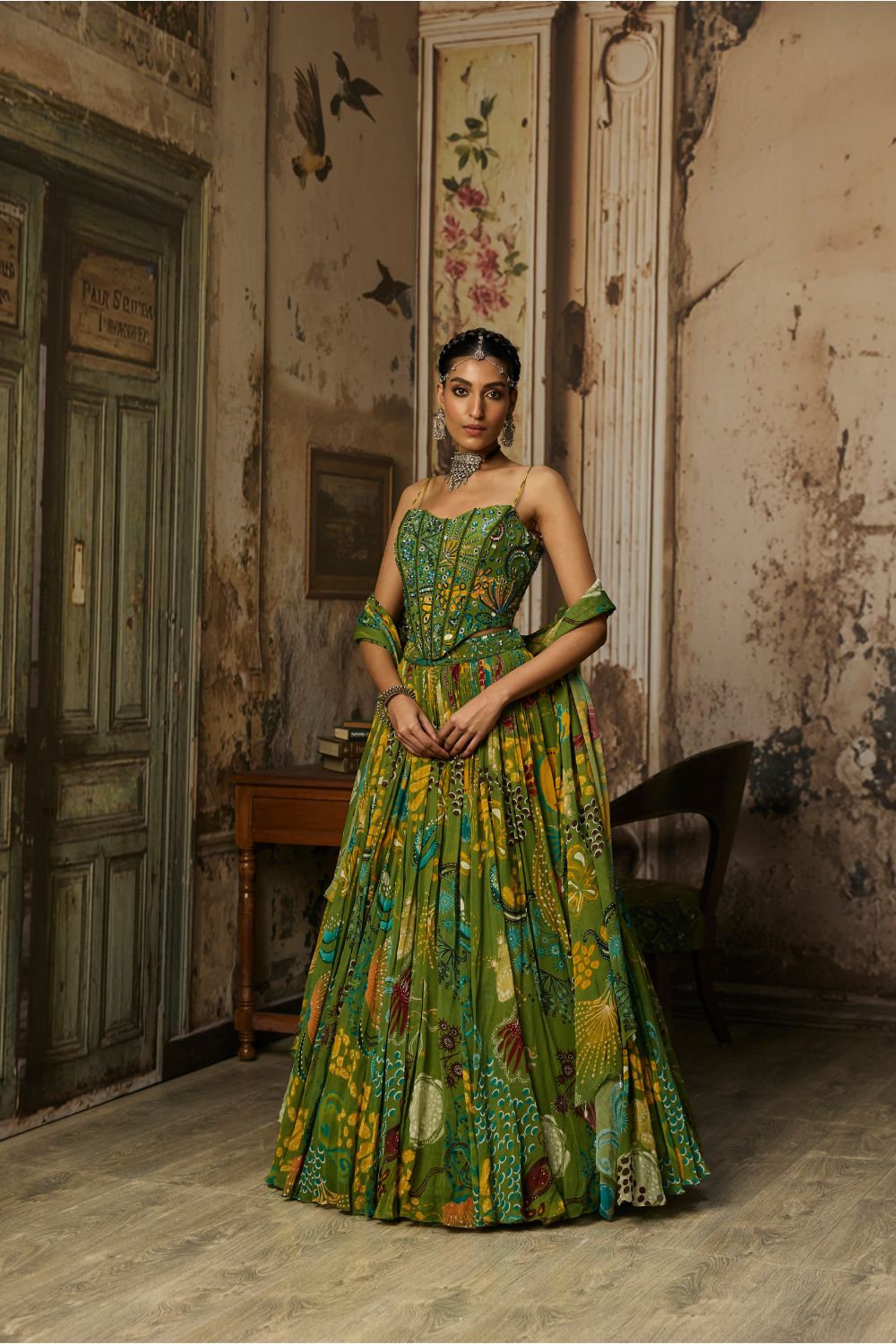 PEAR GREEN PRINTED AND HIGHLIGHTED CORSET LEHENGA SET