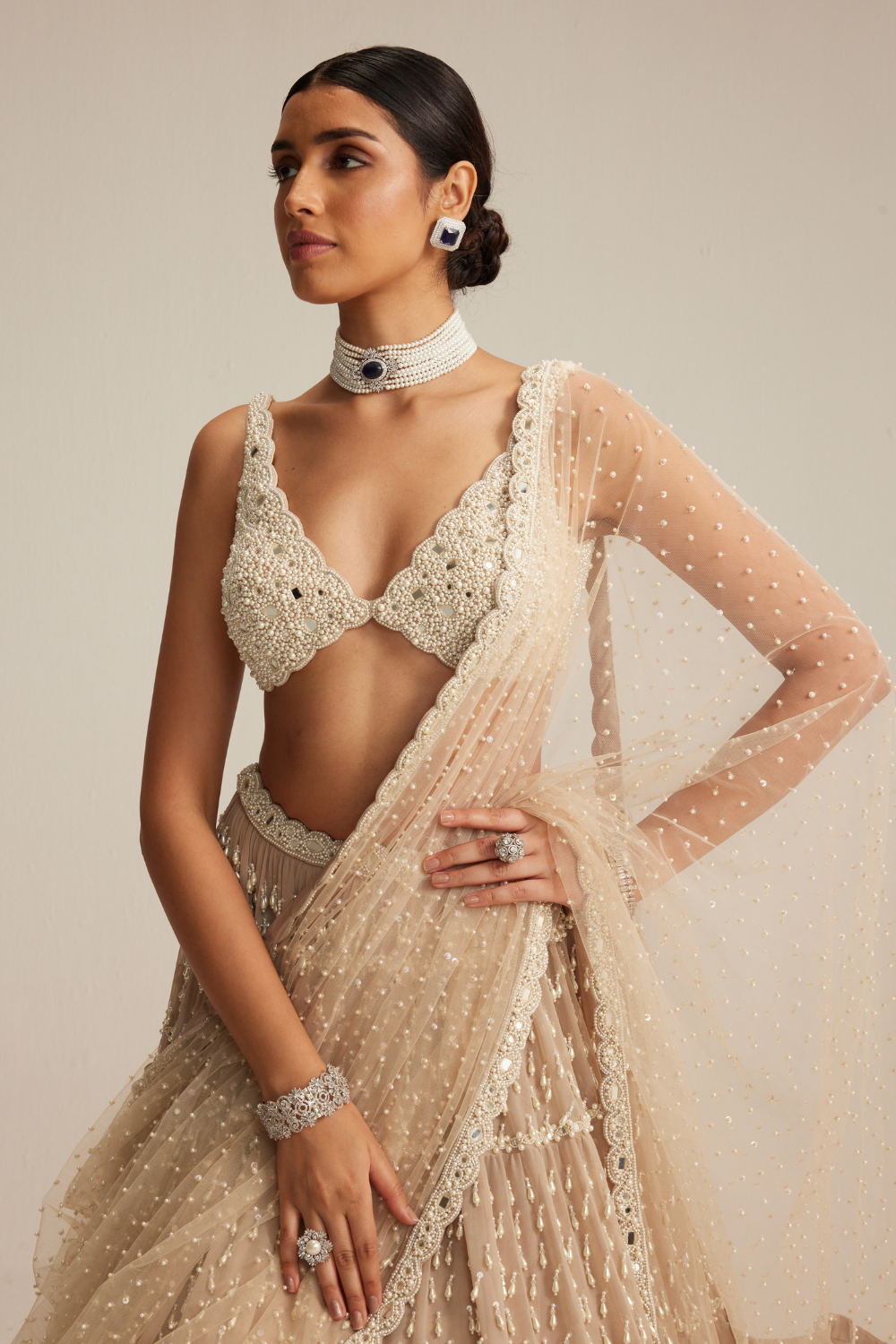 Light Beige Pearl Drop Multitier Lehenga with V neck Blouse