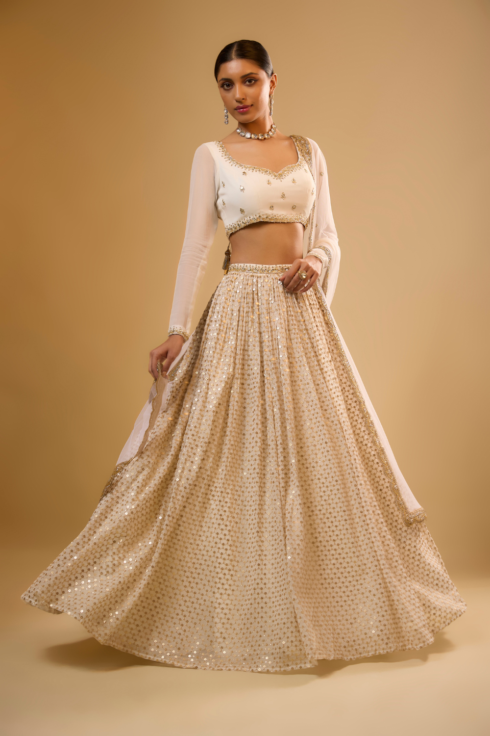 Vanilla white georgette lehenga set embroidered with mirrors and gold sequins