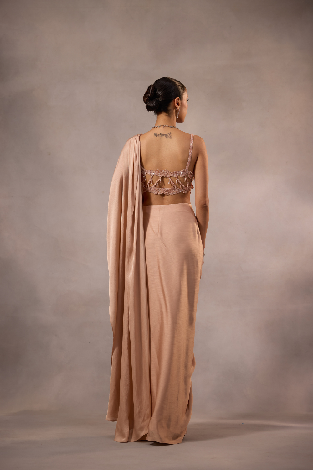 Champagne Pink  Draped Saree Set with Embellished Bustier Blouse