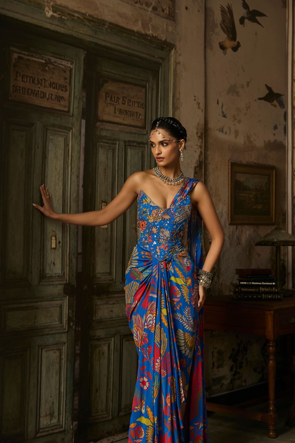 ELECTRIC BLUE PRINTED AND HIGHLIGHTED CORSET DHOTI SKIRT SAREE SET