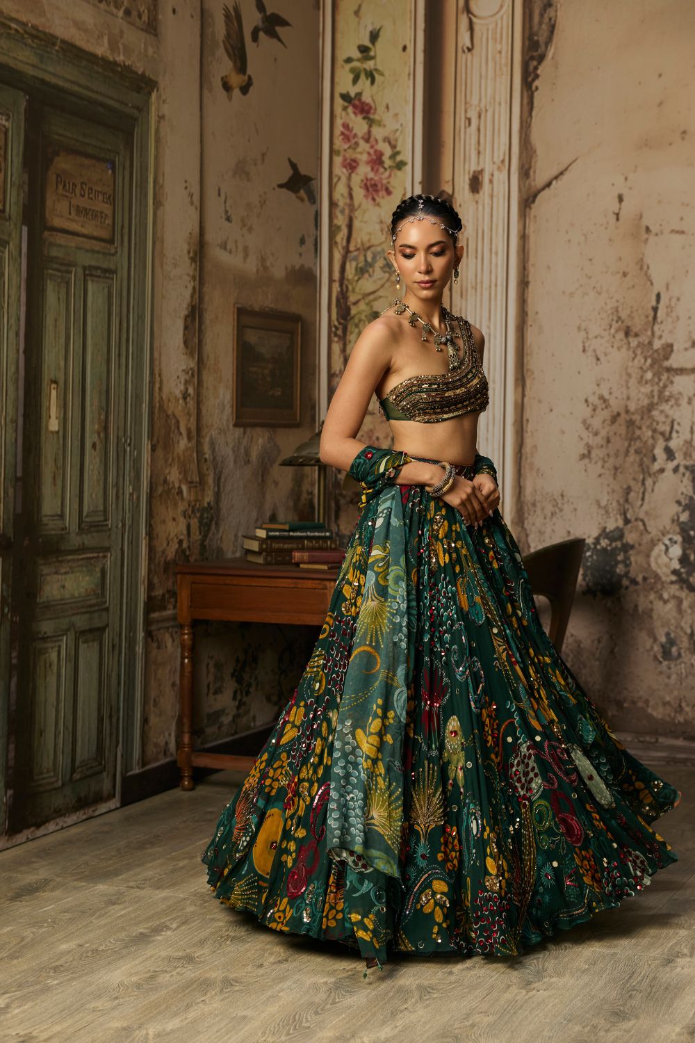 DARK GREEN EMBELLISHED BOUSE WITH PRINTED AND HIGHLIGHTED LEHENGA SET