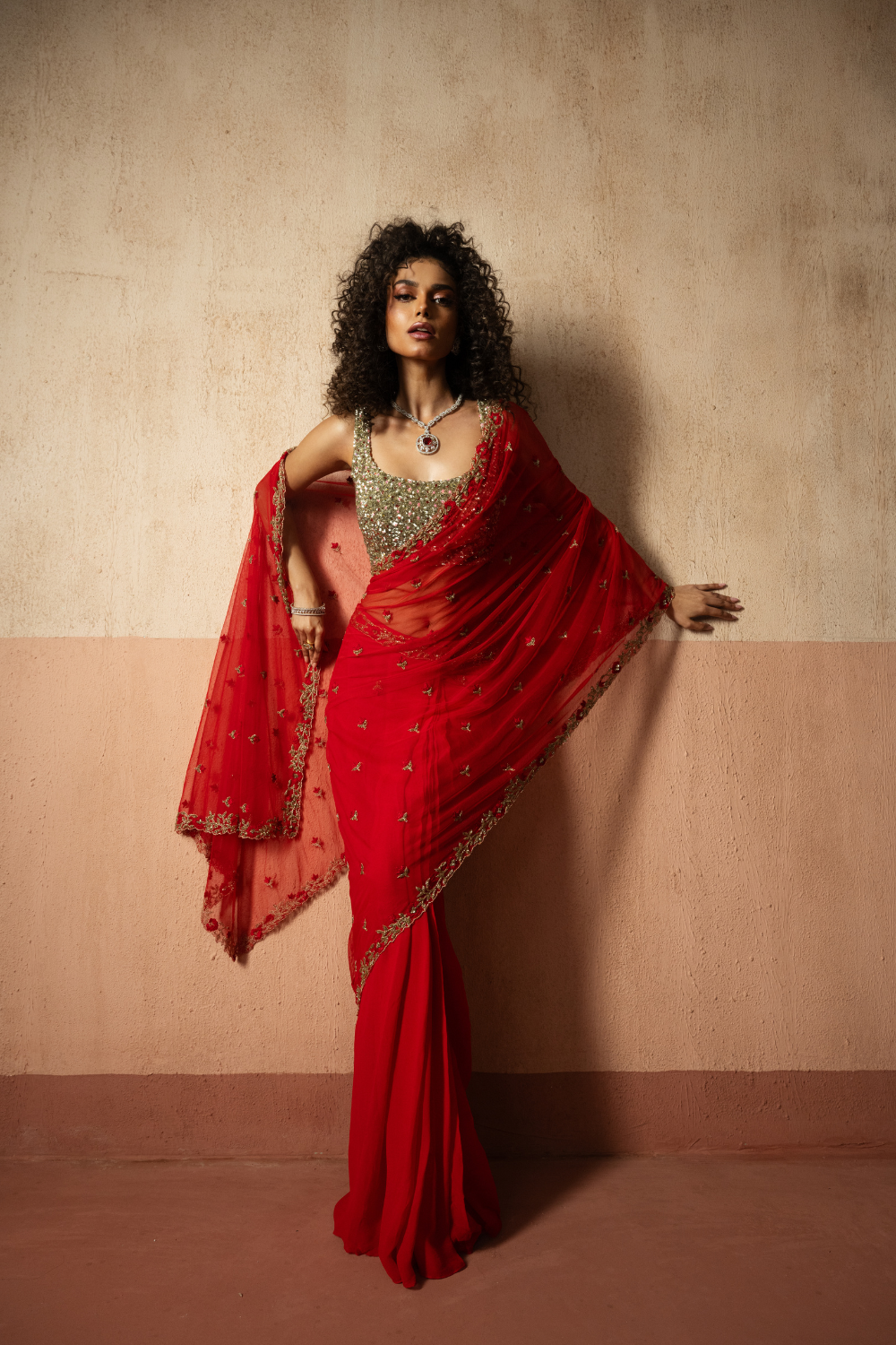 Predraped , red , hand embroidered net & georgette saree with golden blouse