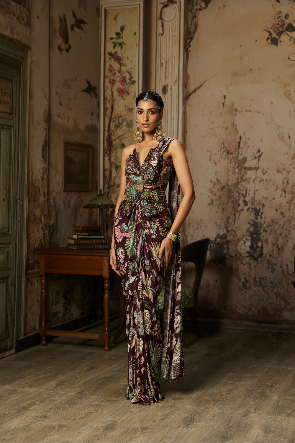 PLUM PRINTED AND HIGHLIGHTED CORSET WITH DHOTI SKIRT SAREE SET