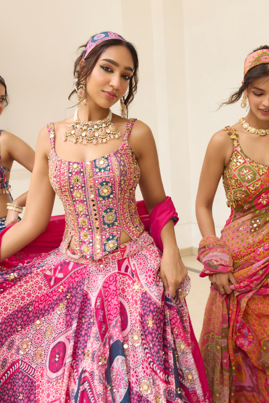 FUSCHIA PRINT AND HIGHLIGHTED CORSET BLOUSE LEHENGA SET