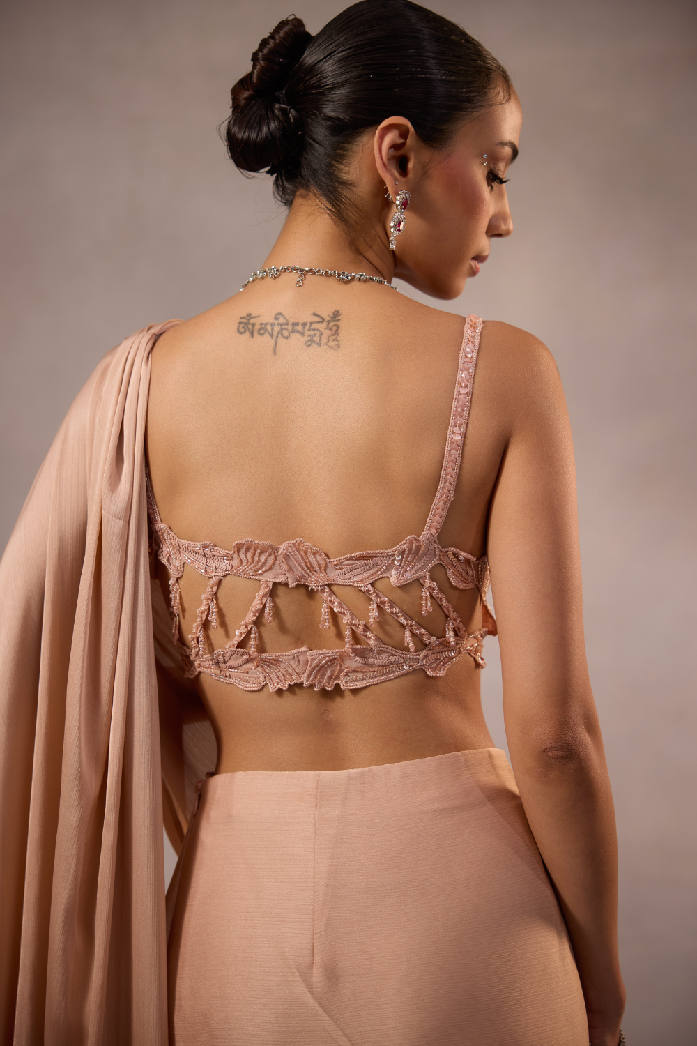 Champagne Pink  Draped Saree Set with Embellished Bustier Blouse