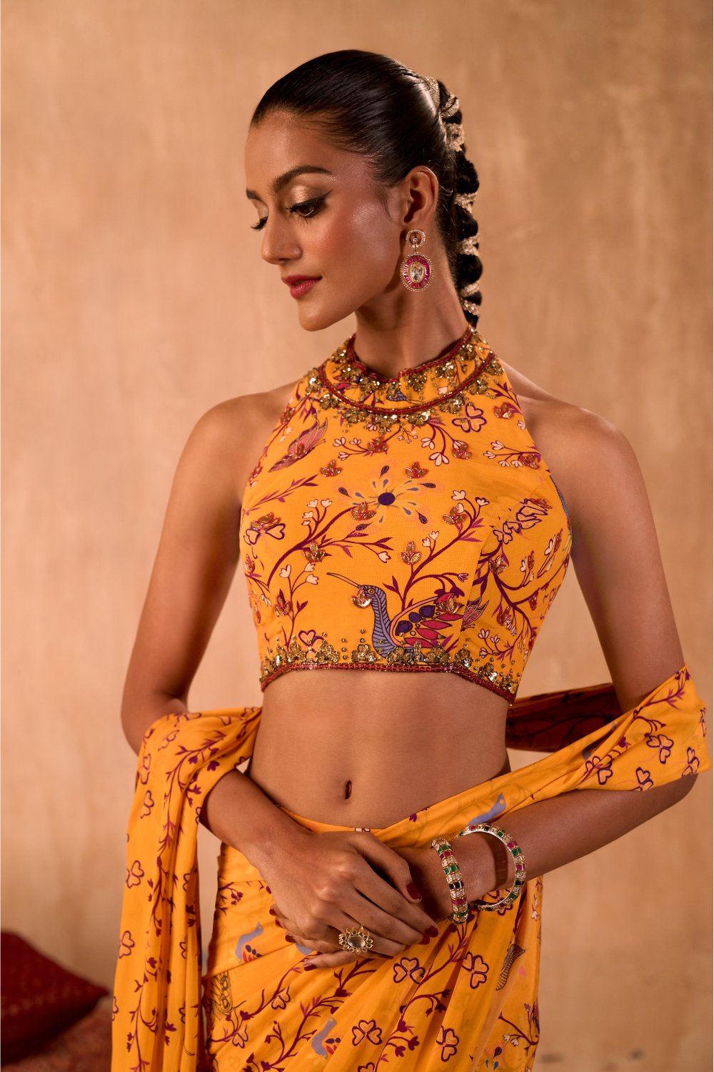 YELLOW PRINT EMBROIDERED HALTER CHOLI AND PREDRAPED SARI SET