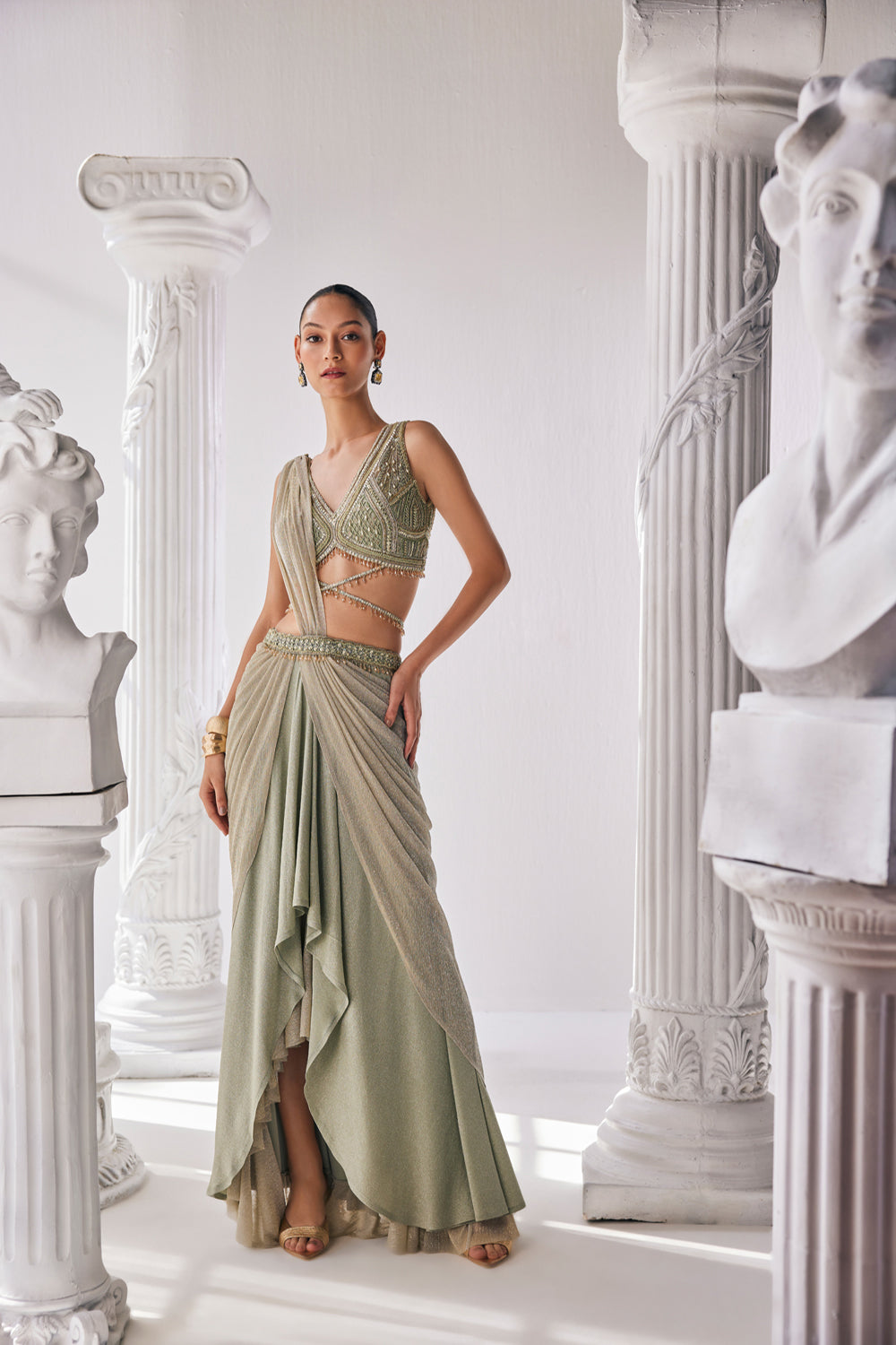 Jade Green Coloured Draped Saree In Lycra And Crinkle Fabric. It Features A Plunging Neck Blouse With Beadwork And Sequin Detailing.
