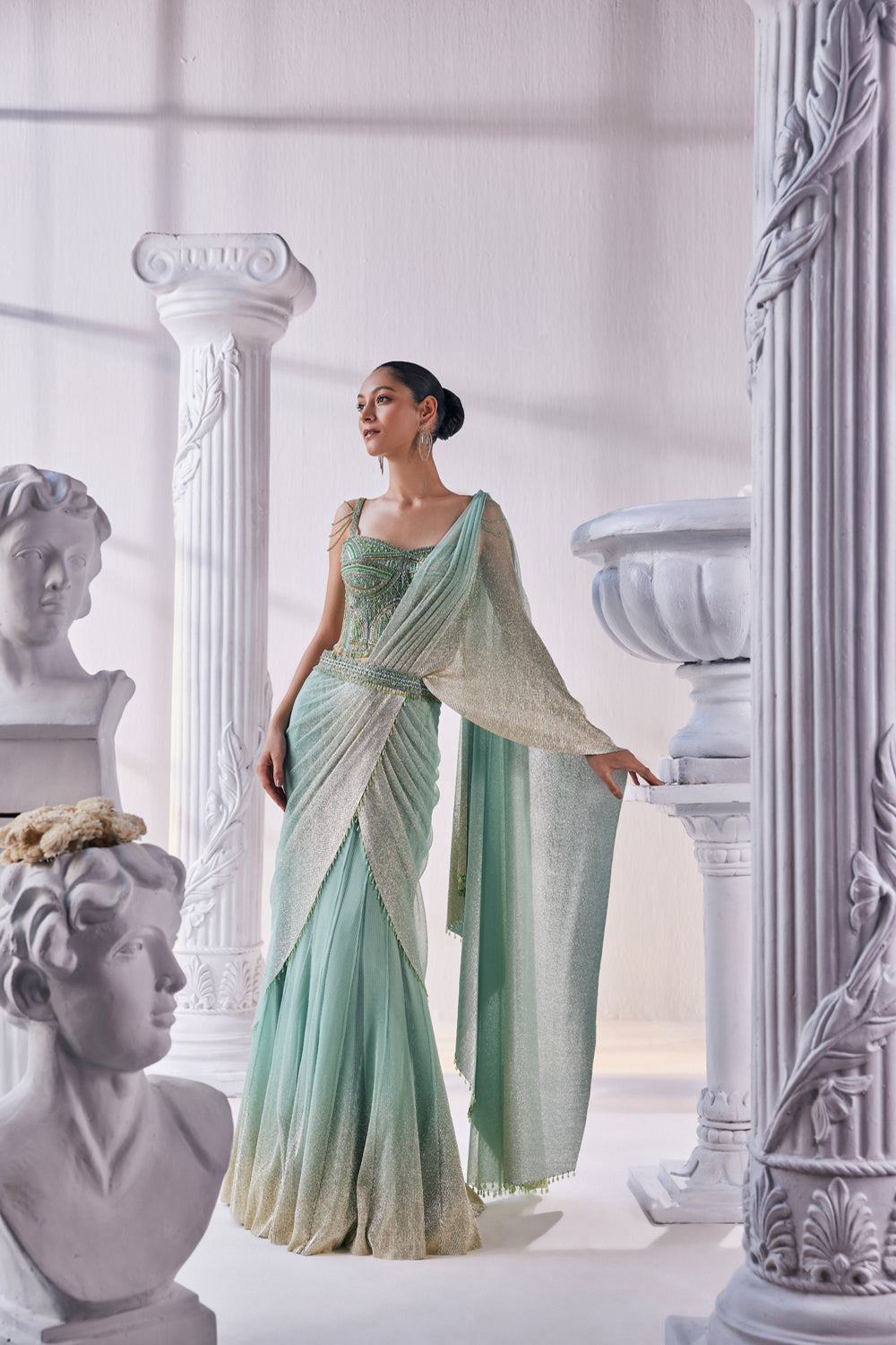 Draped Layer Lehenga In Sequin And Pleated Gold Foil Lycra. The Corsetfeatures Heavy Beads, Tassels And Zardozi Work.