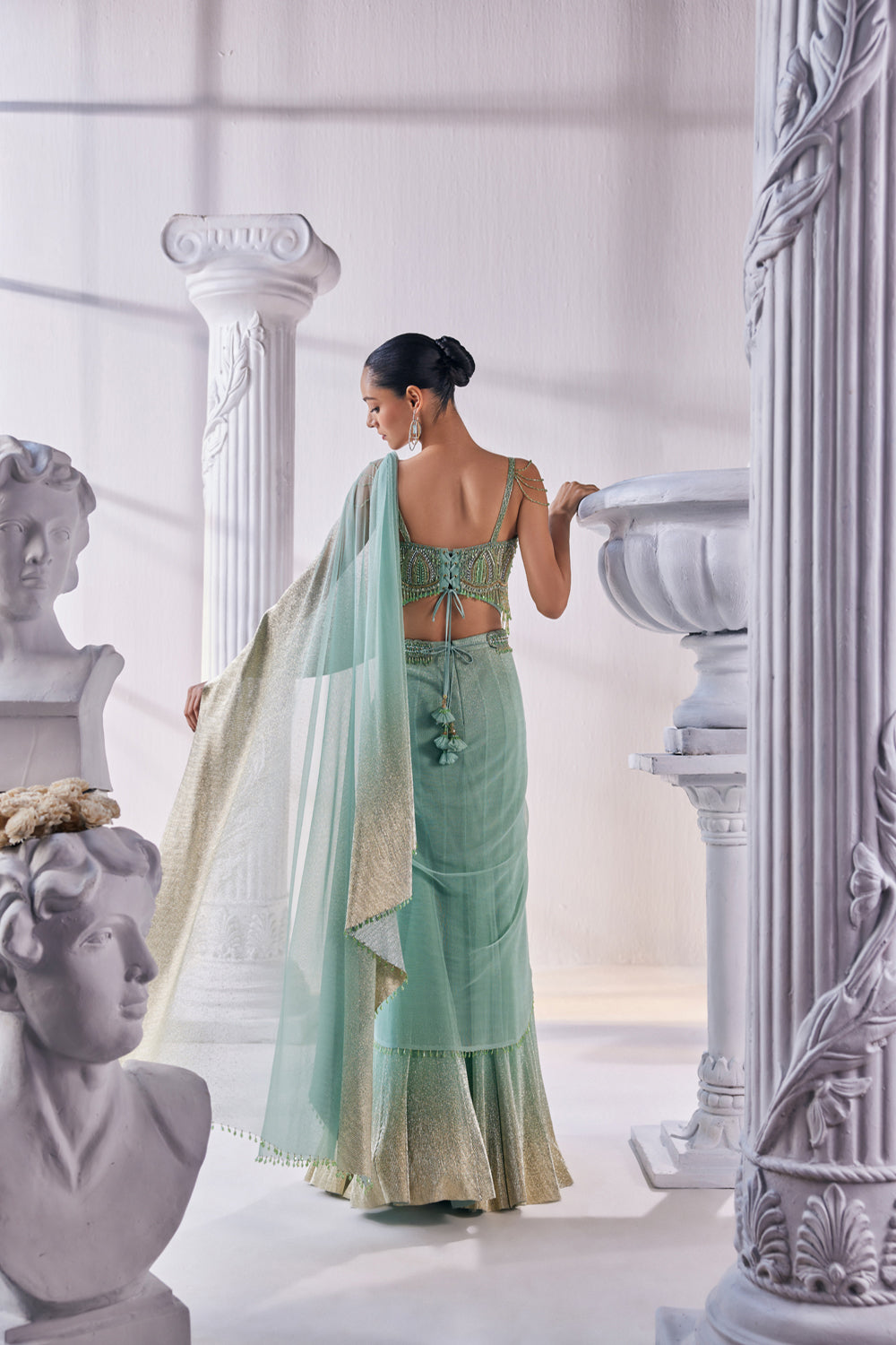 Draped Layer Lehenga In Sequin And Pleated Gold Foil Lycra. The Corsetfeatures Heavy Beads, Tassels And Zardozi Work.