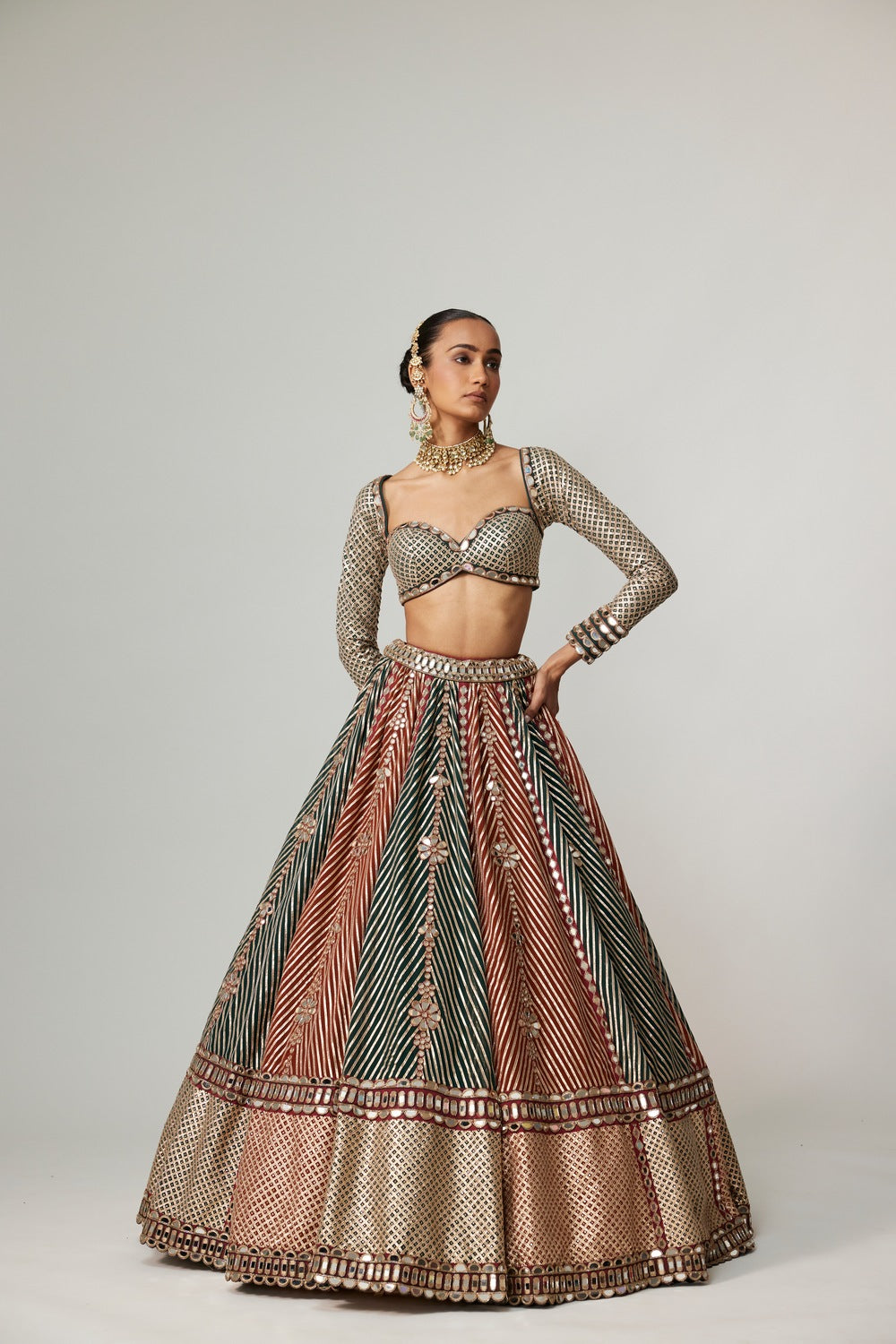 CRANBERRY FLOWER LINEAR LEEHNGA WITH FULL SLEEVE BLOUSE.