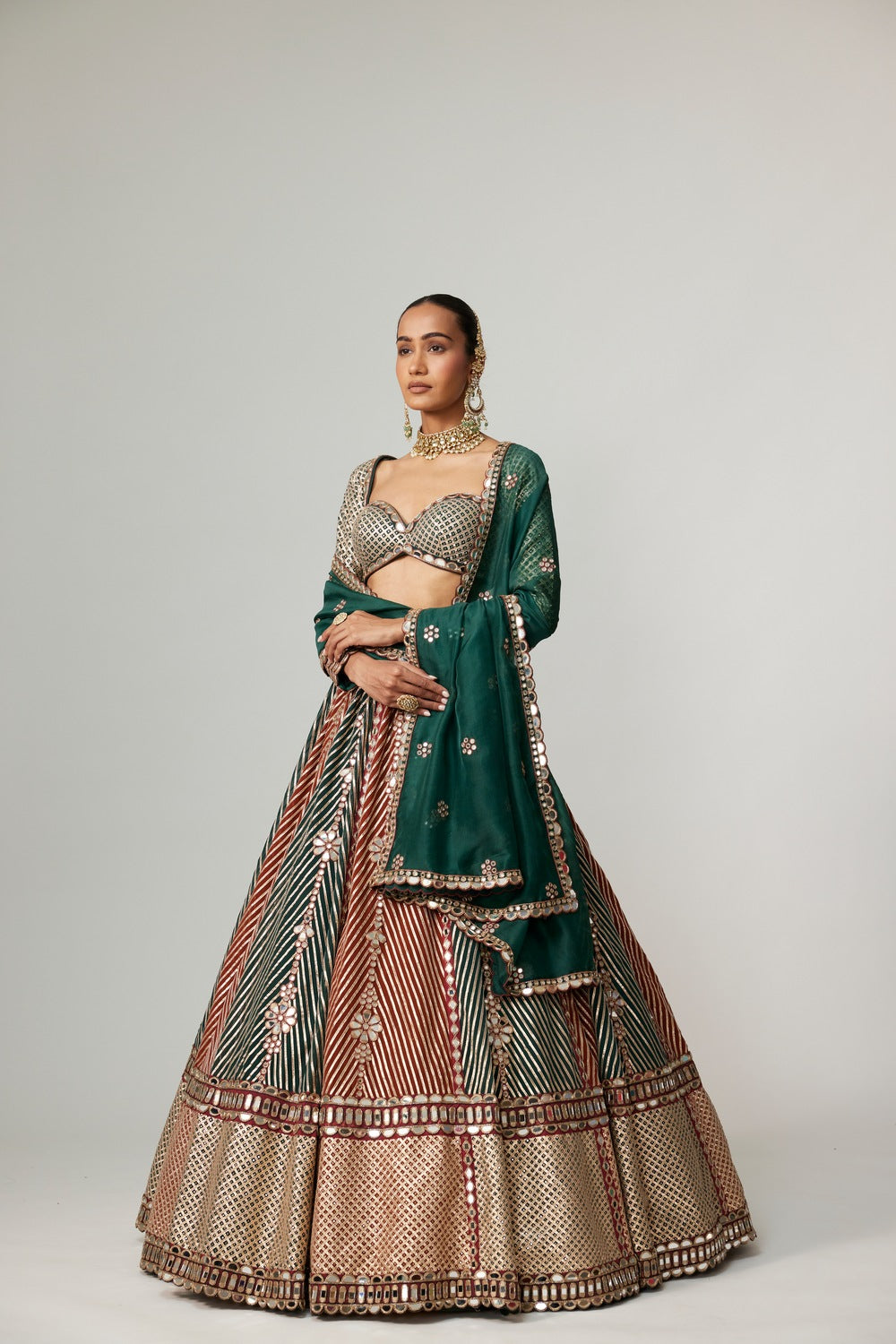 CRANBERRY FLOWER LINEAR LEEHNGA WITH FULL SLEEVE BLOUSE.