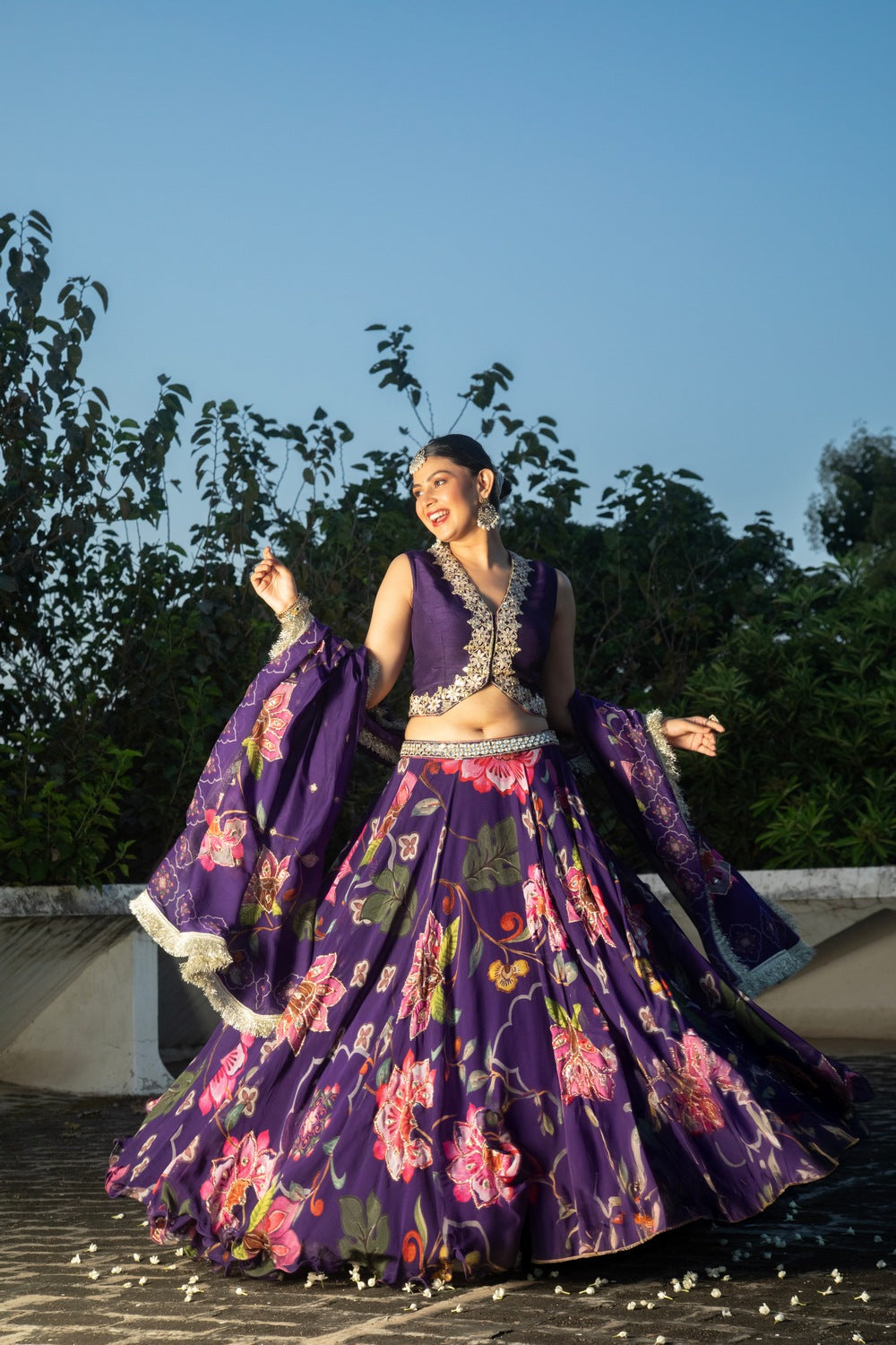 Purple floral lehenga with mirror-work waistcoat and placement dupatta