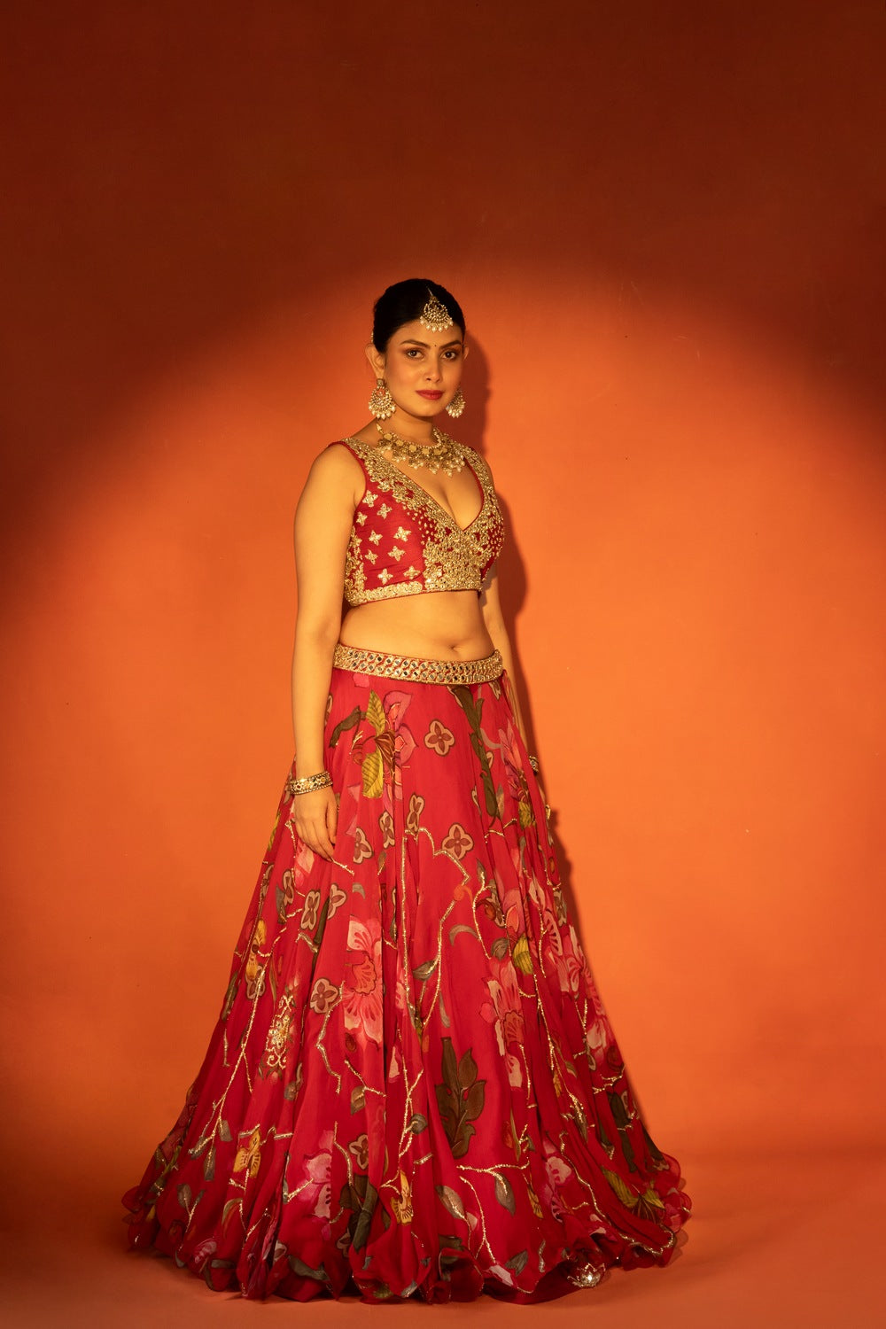 Red floral lehenga with mirror-work blouse and placement dupatta
