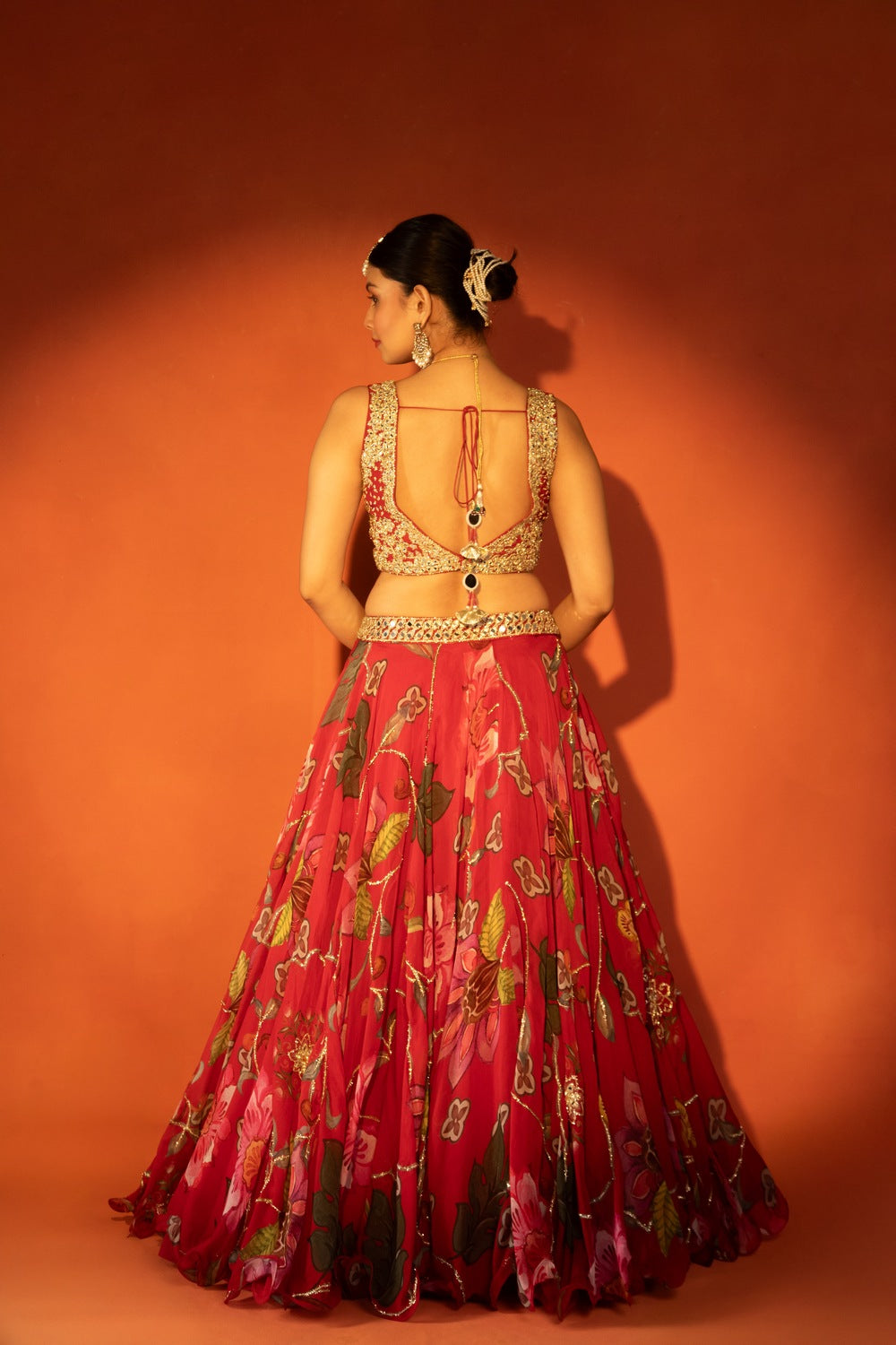 Red floral lehenga with mirror-work blouse and placement dupatta
