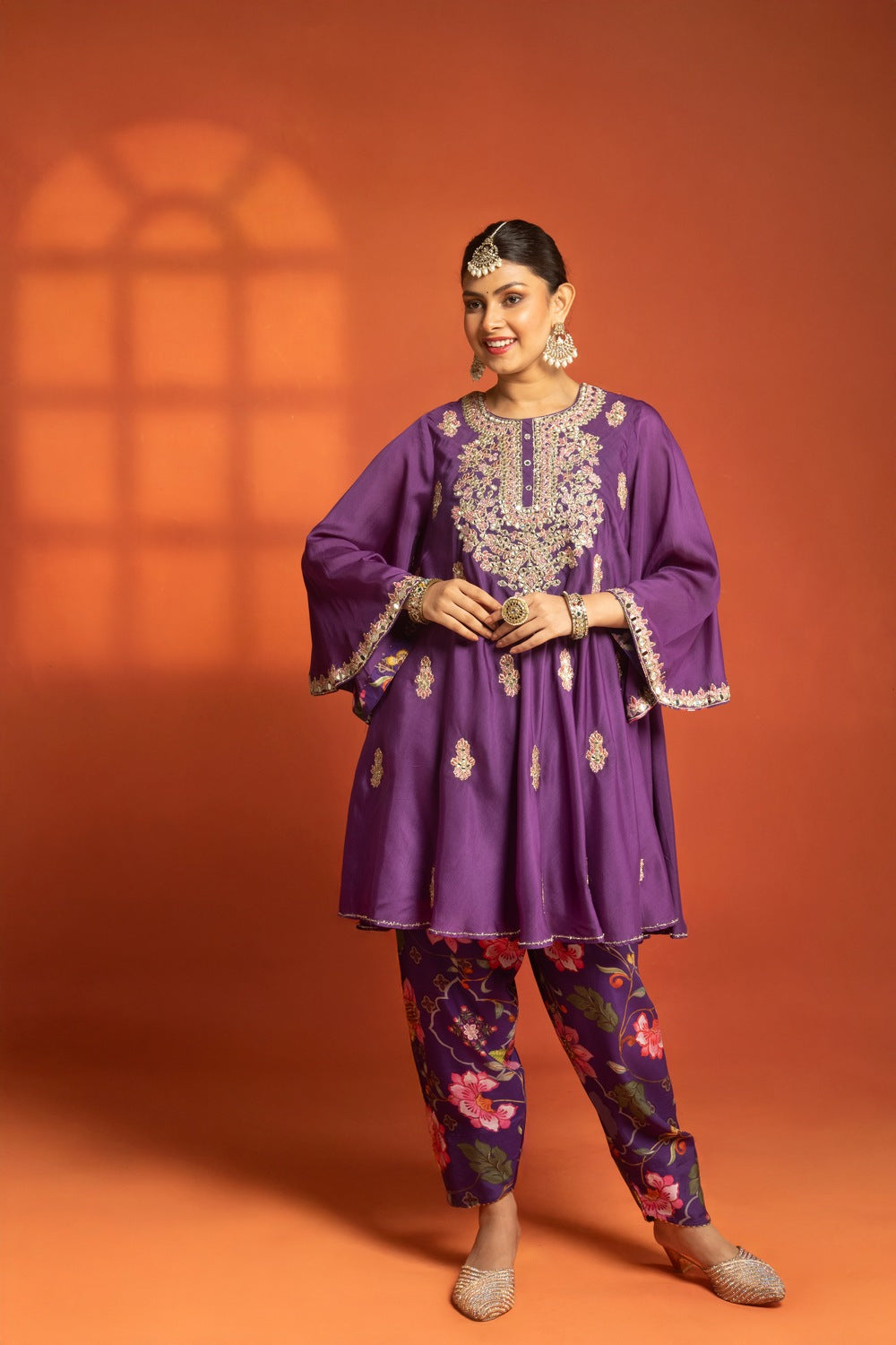 Purple Short Semi- Anarkali with a heavily Embroidered Neckline, Paired with Floral Printed Salwar Pants & Dupatta